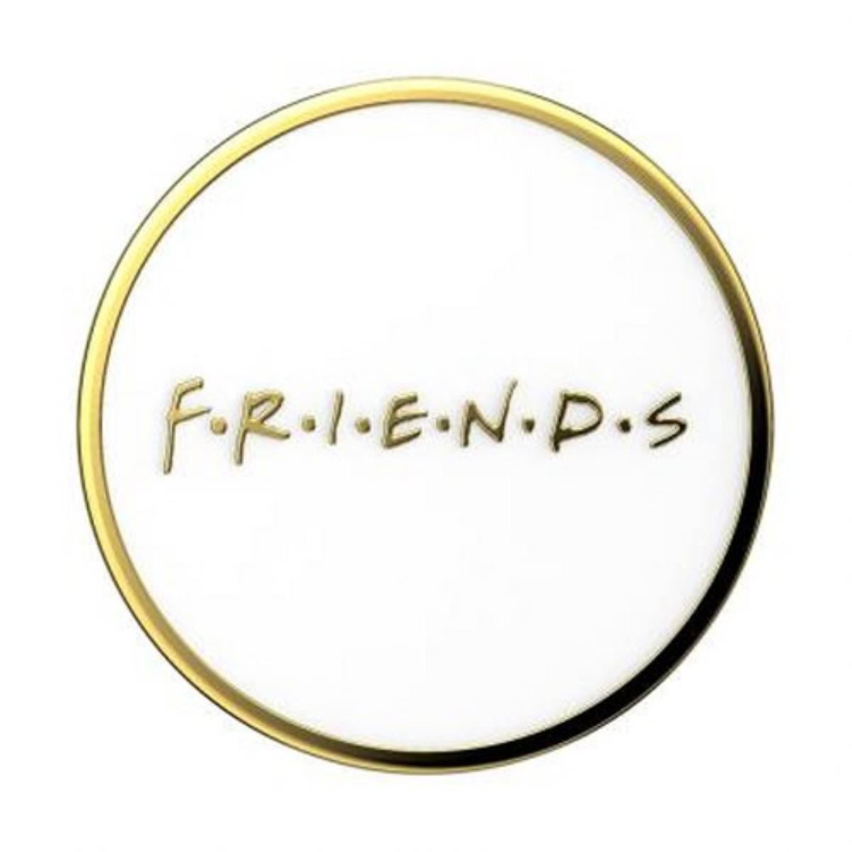 La palabra FRIENDS está escrita en letras doradas sobre un círculo blanco con borde dorado.