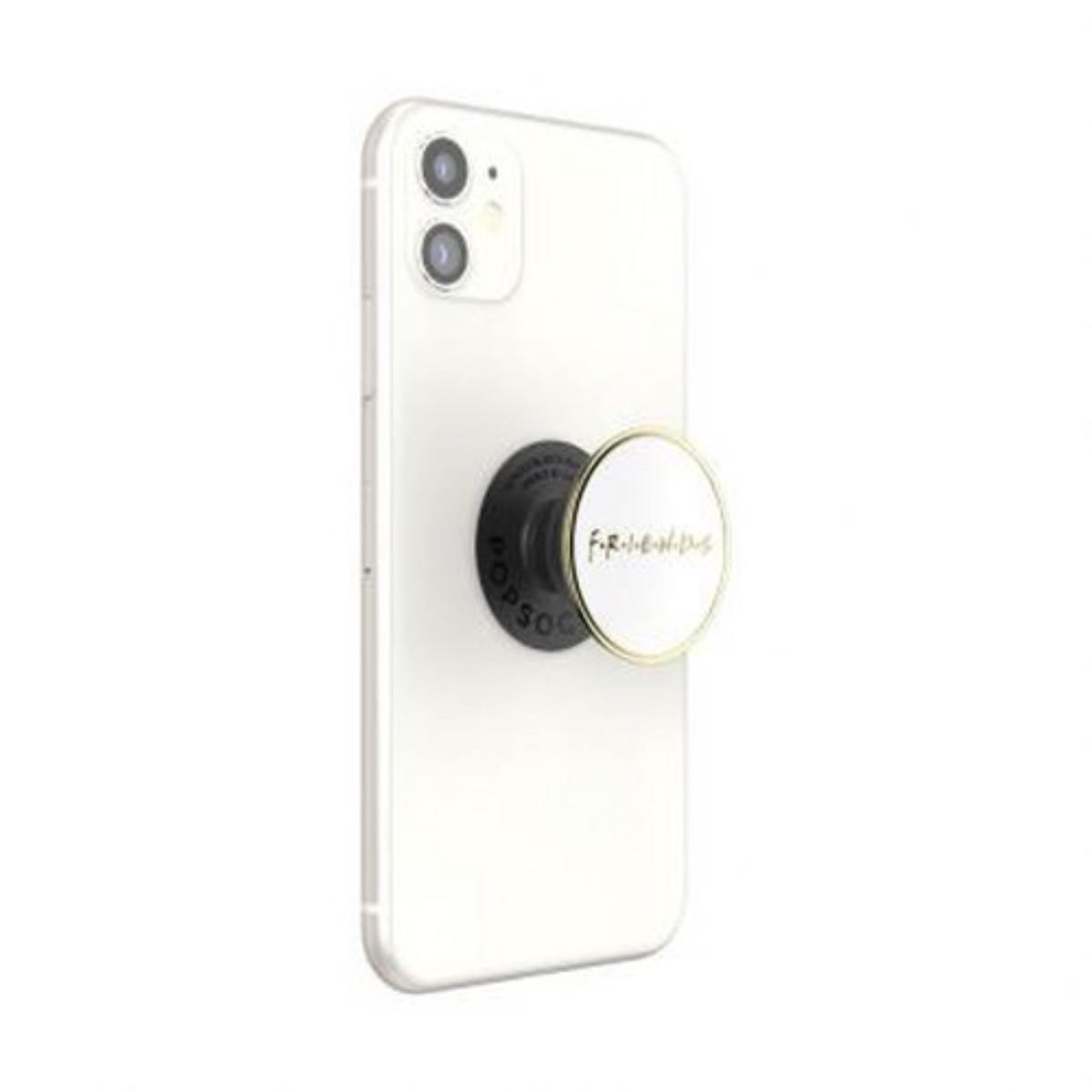 Un smartphone blanco con un PopSocket negro que muestra