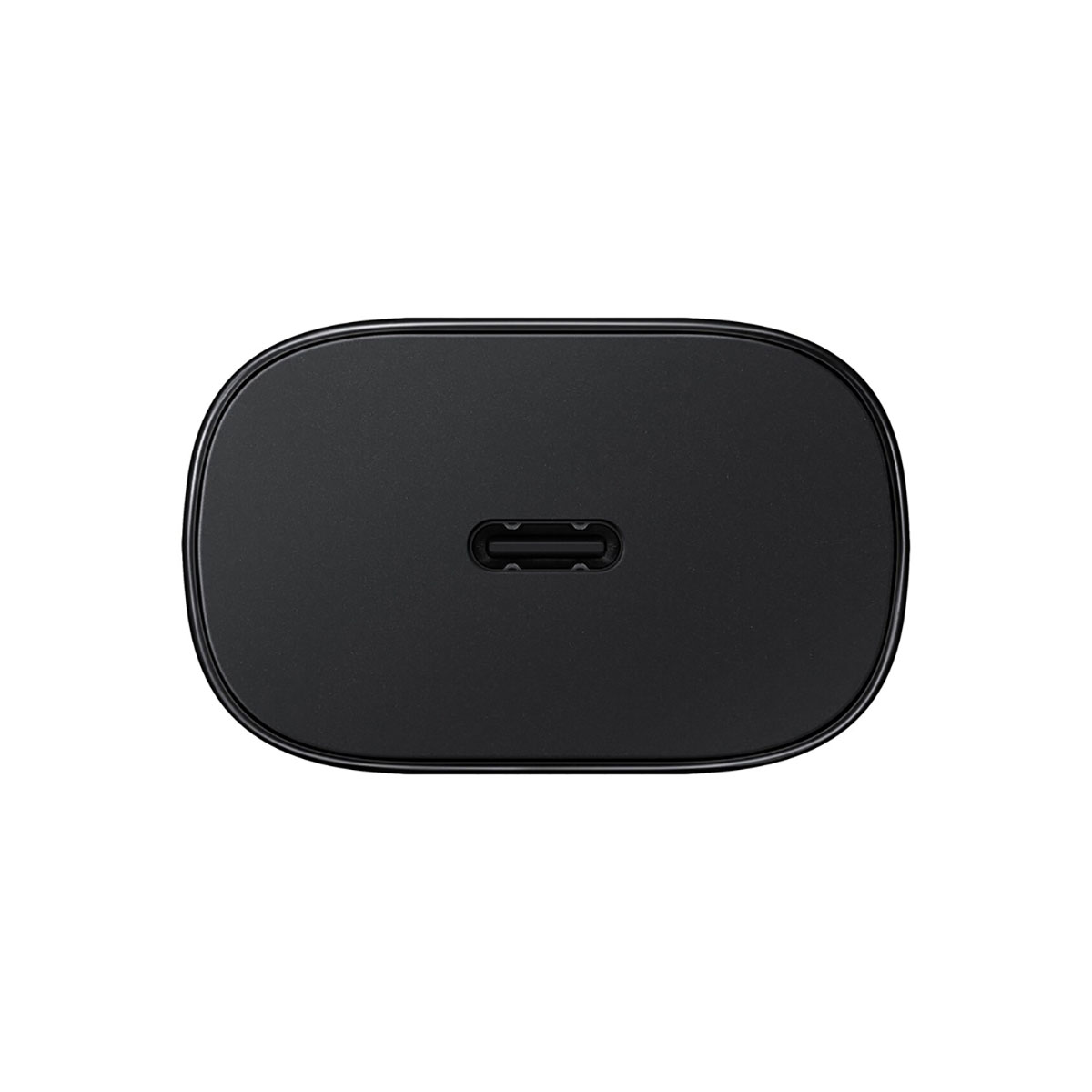 Ein schwarzes, ovales Netzteil mit einem USB-C-Anschluss in der Mitte.