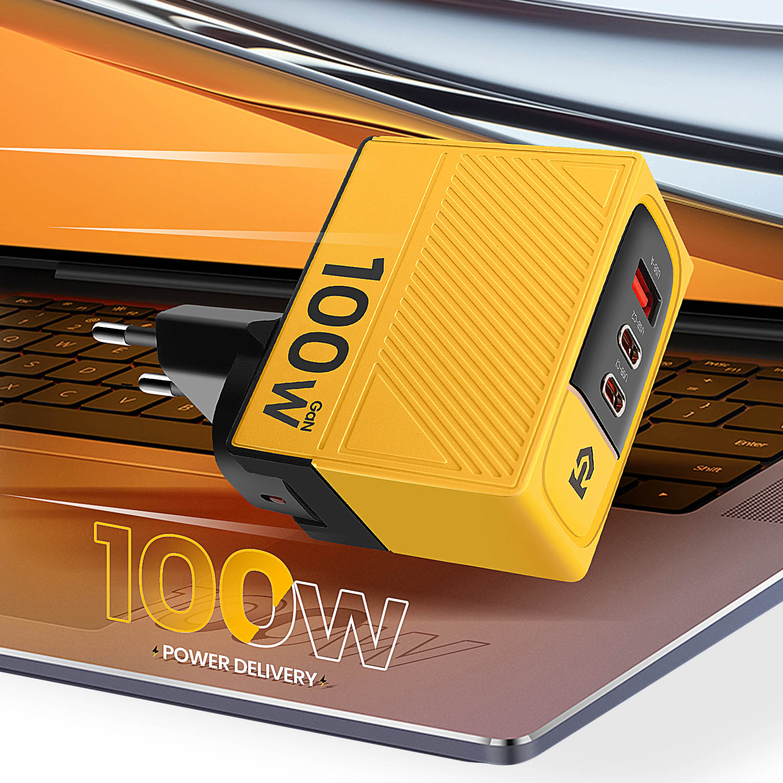 Un alimentatore GAN giallo da 100W con porte USB su una tastiera per laptop.