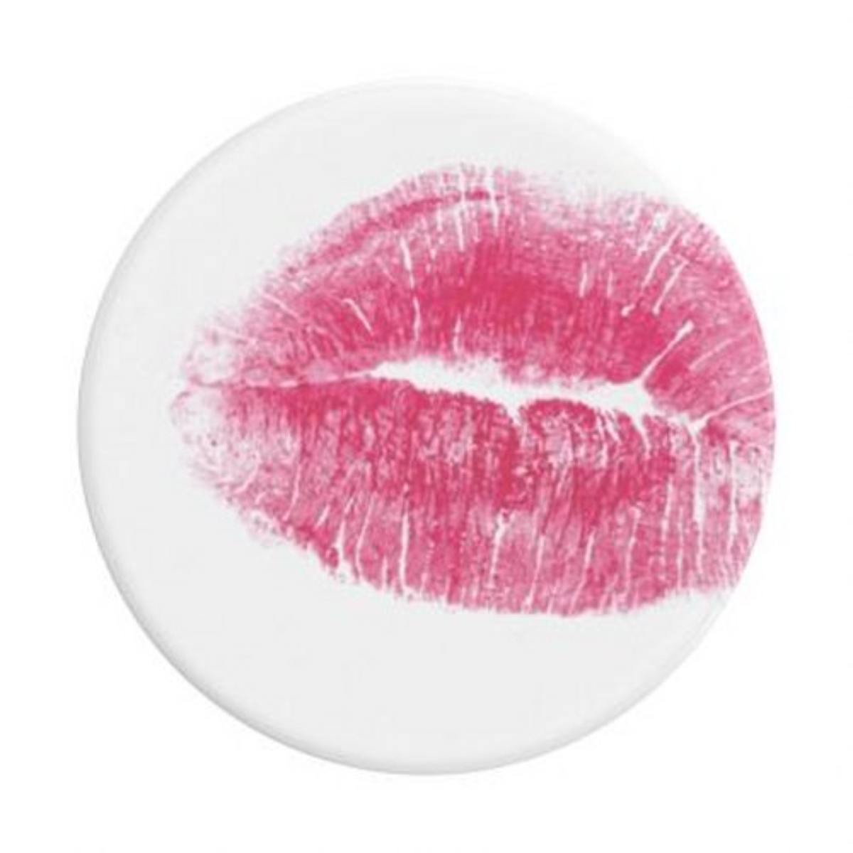 Un'impronta di rossetto rosa su sfondo bianco.