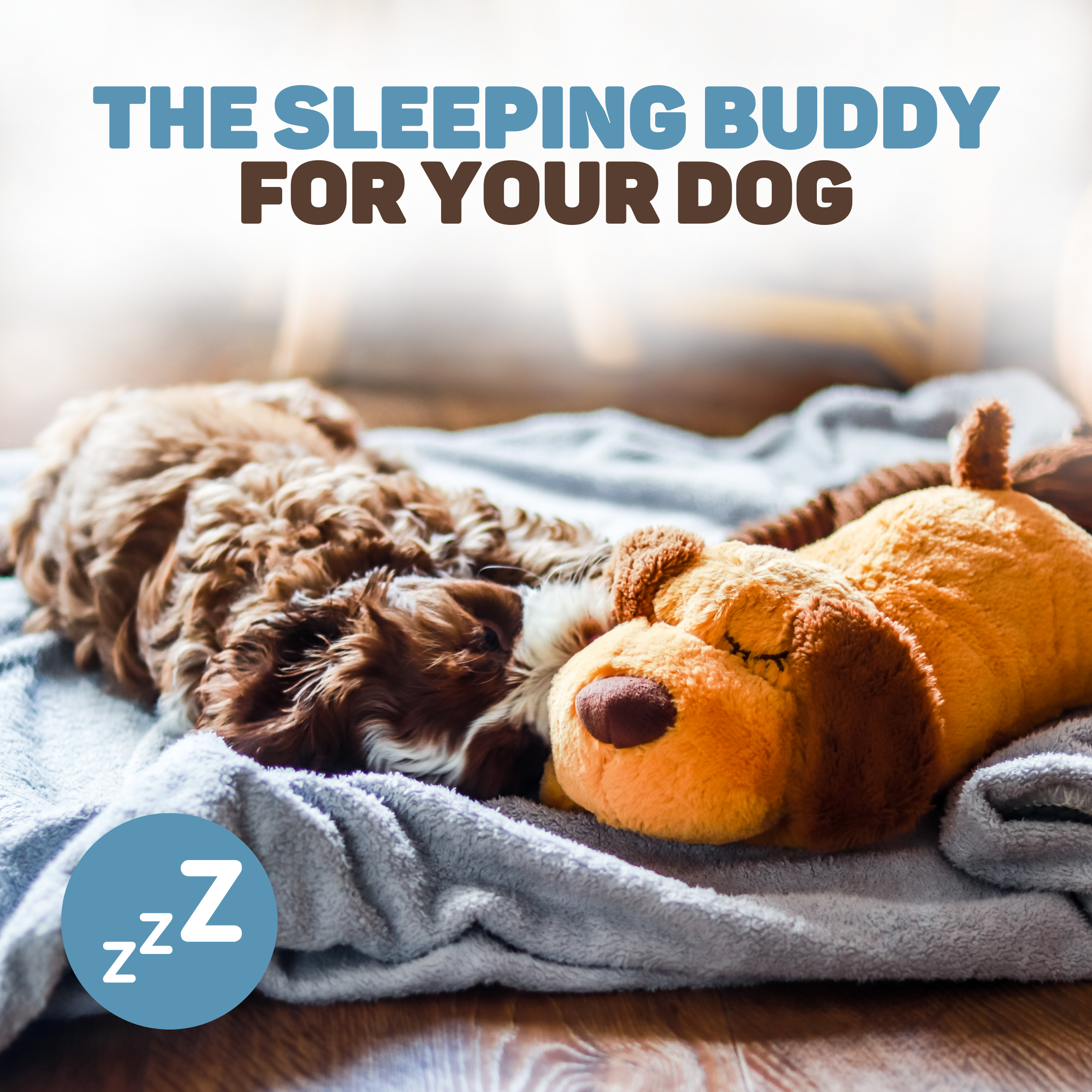 A brown dog sleeps on a gray blanket next to a stuffed dog toy.