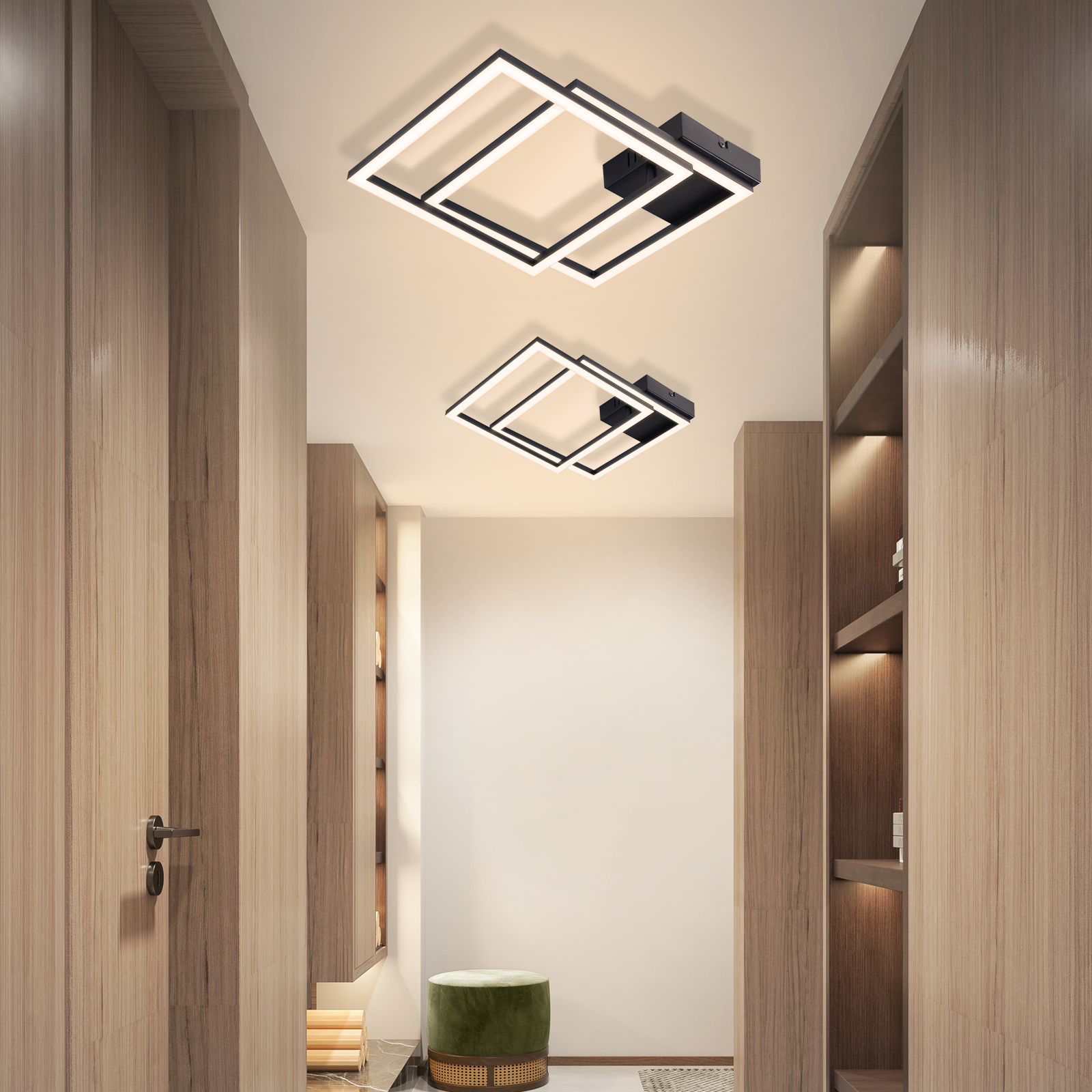 Corridoio moderno con due plafoniere quadrate, pannelli in legno e un pouf verde.