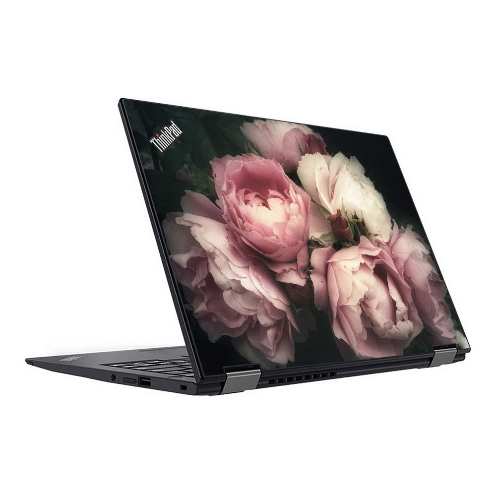 Een open laptop met een bloemenpatroon op het scherm.