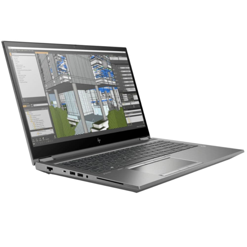 Un portátil abierto mostrando un diseño arquitectónico CAD en pantalla.