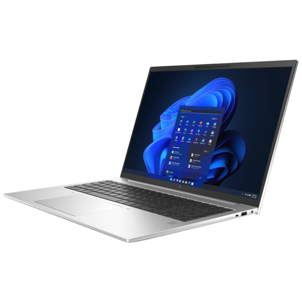 Een open zilveren laptop met een blauwe achtergrond op het scherm.