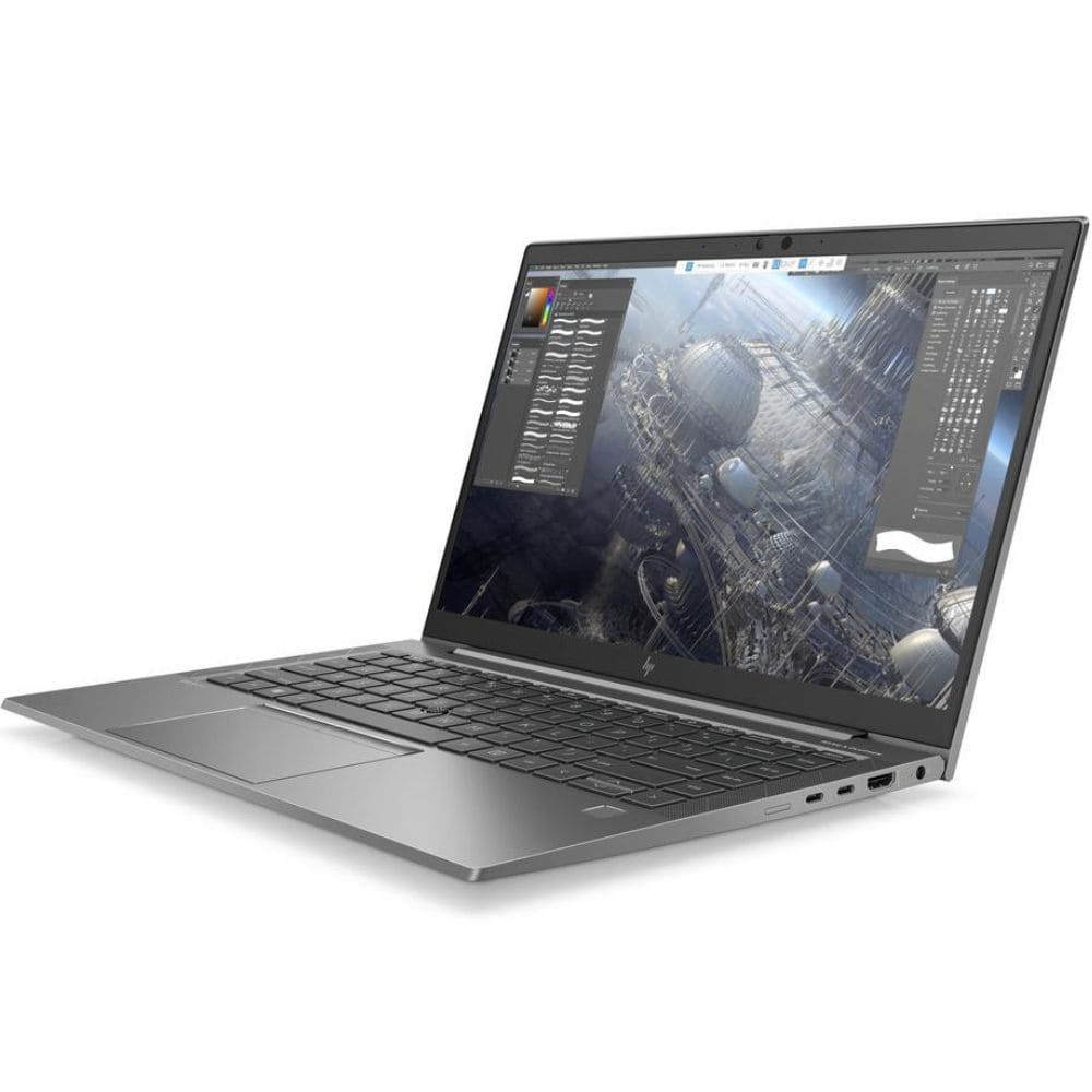Un portátil plateado que muestra un complejo modelo 3D en su pantalla.
