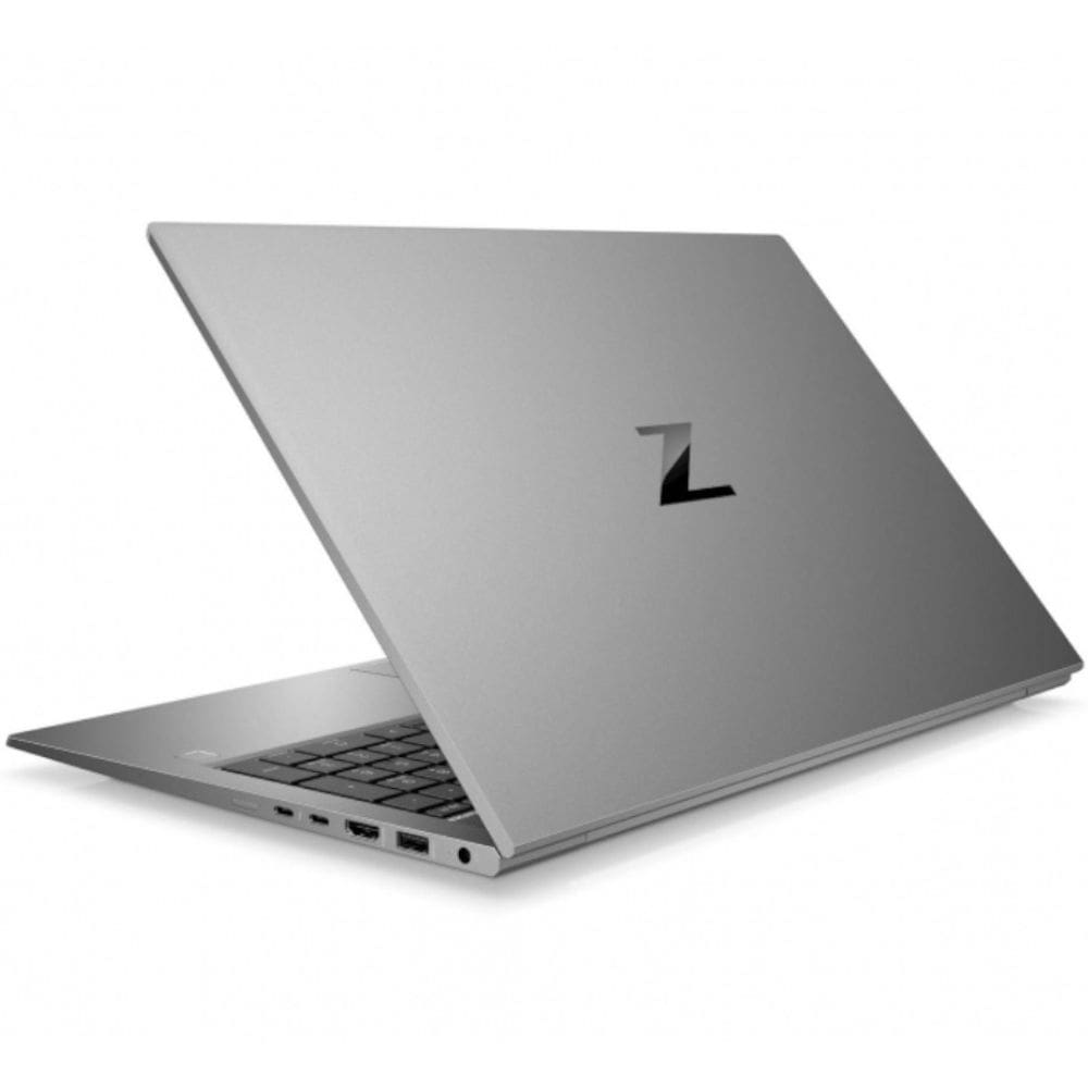Portátil plateado con teclado negro y logo Z negro en la tapa, vista angular.