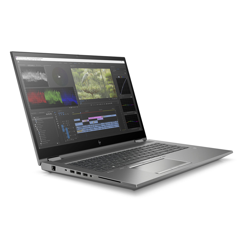 An open silver laptop displaying video editing software on its screen.