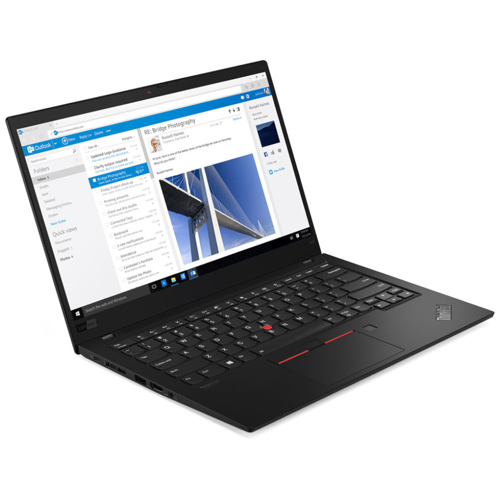 Un ordinateur portable Lenovo noir, écran ouvert, affichant une interface d'e-mail.
