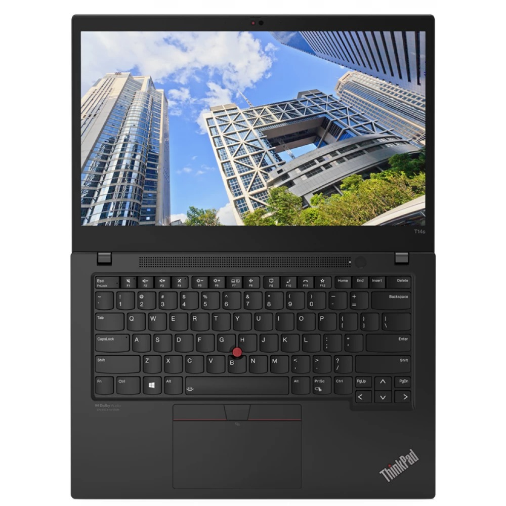Un portátil negro con pantalla abierta que muestra rascacielos bajo cielo azul.