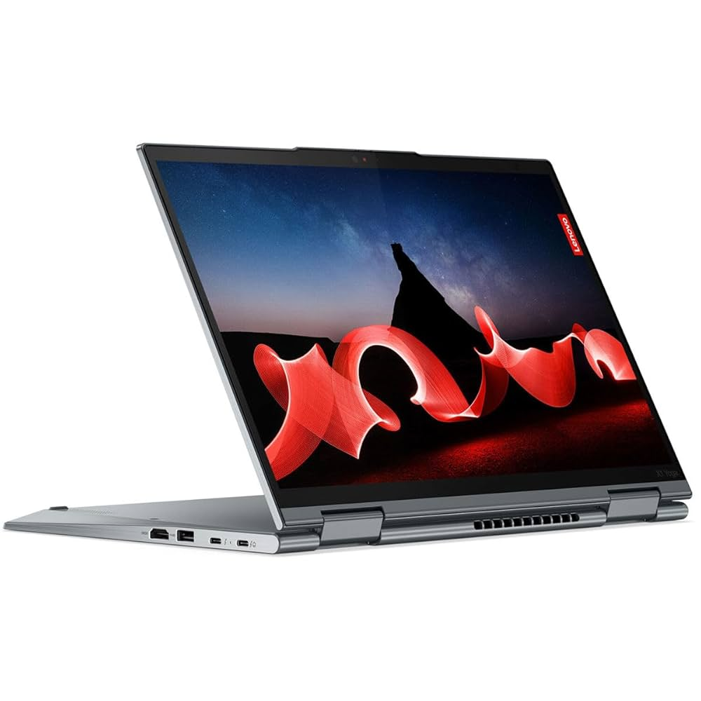 Un laptop grigio Lenovo Yoga con un motivo astratto rosso sullo schermo.