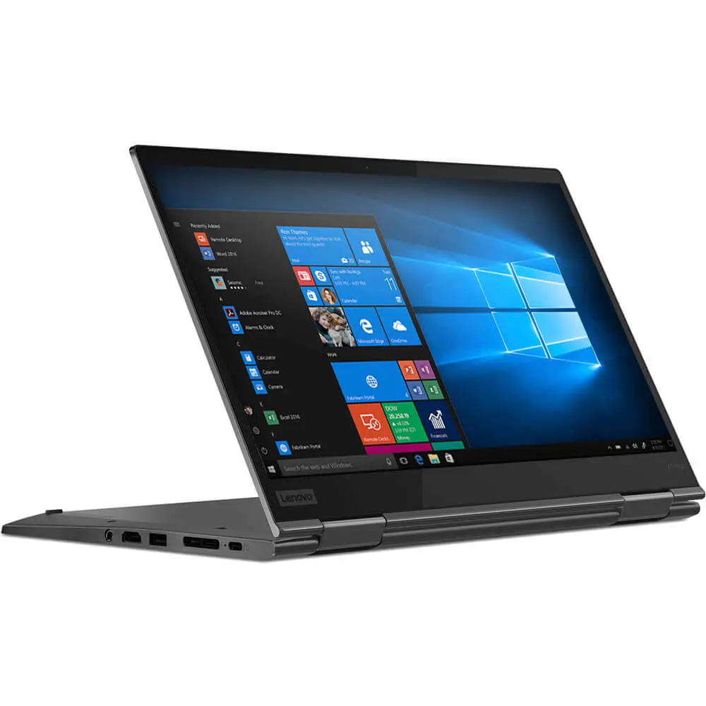 Een open grijze Lenovo laptop met een Windows-startscherm op het display.
