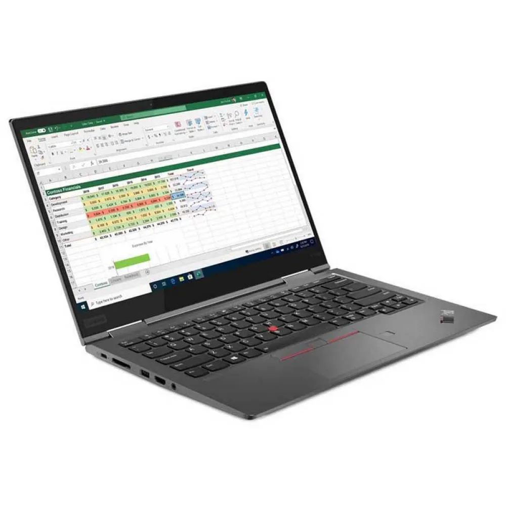 Een open grijze laptop toont een spreadsheet met grafieken op het scherm.