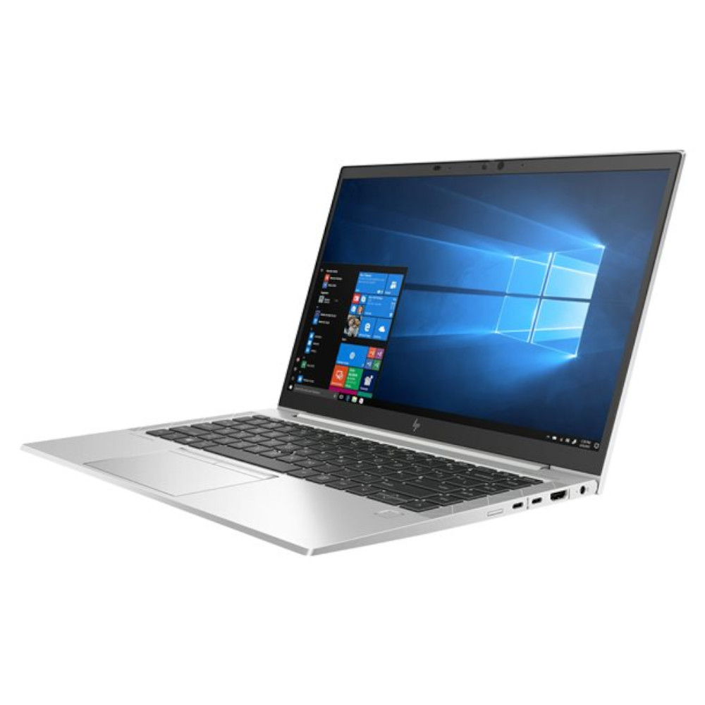 Un portátil plateado con la pantalla abierta, mostrando el sistema Windows.