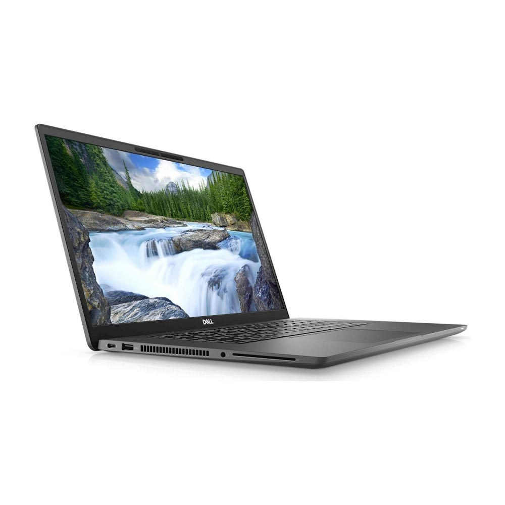 Un ordinateur portable Dell ouvert affiche une image de cascade sur son écran.