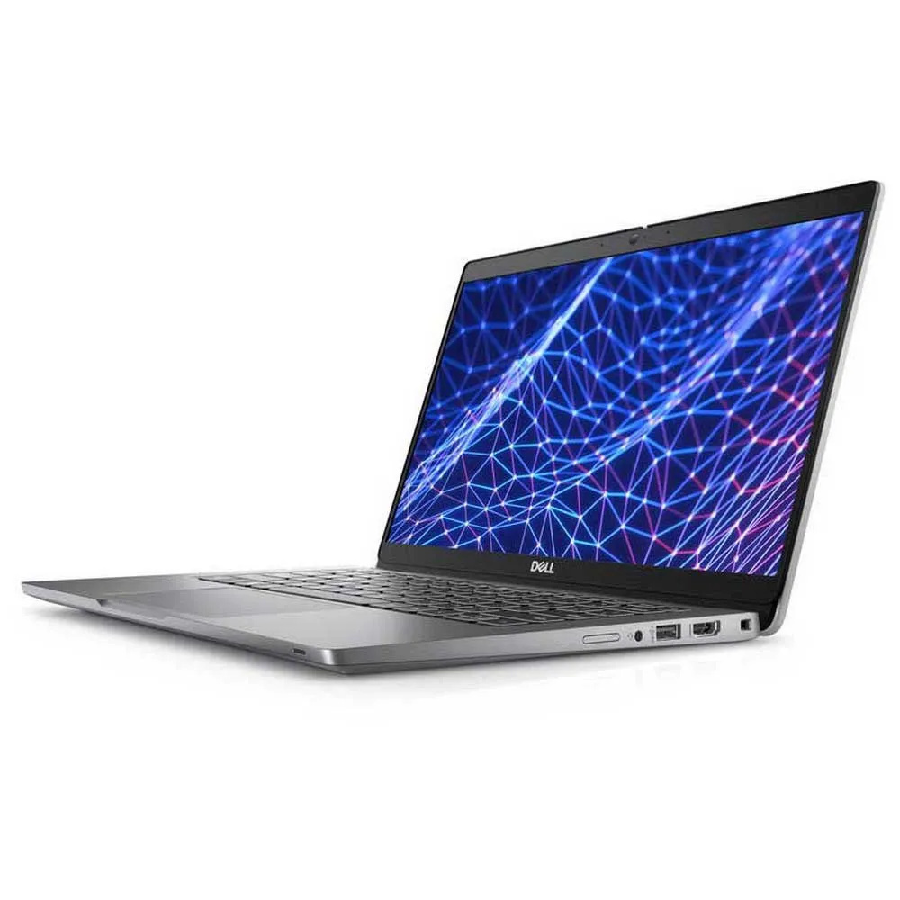 Un ordinateur portable Dell argenté affichant un fond de réseau bleu.