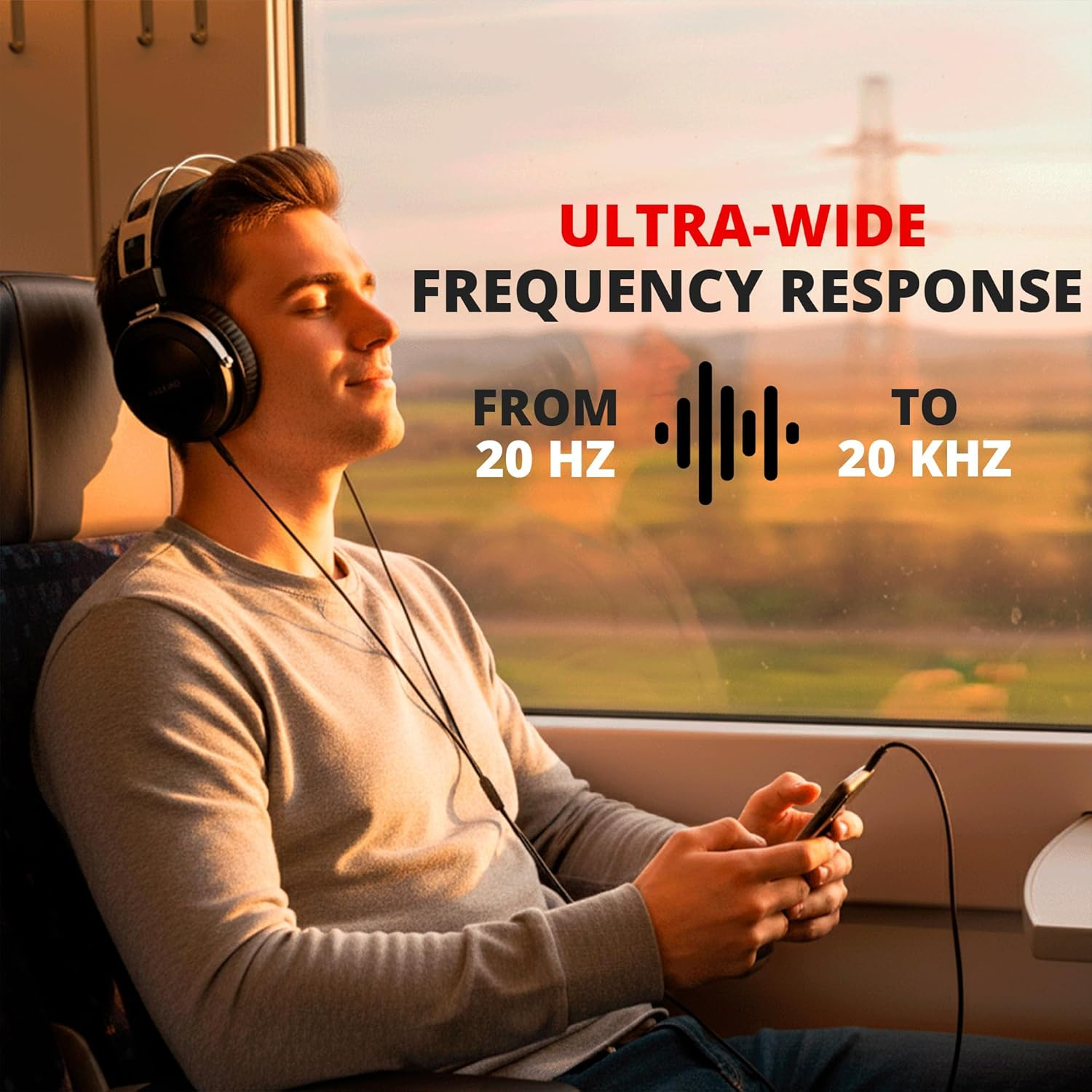 Uomo con cuffie ascolta musica in treno con testo: ULTRA-WIDE FREQUENCY RESPONSE.