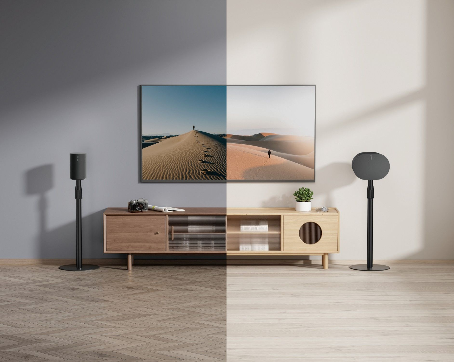 Minimalist living room with TV, speakers, and wooden furniture.