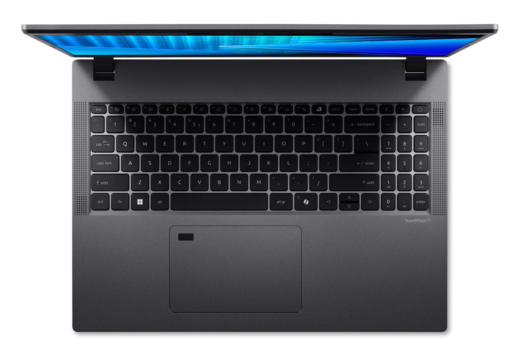 Vista superior de un portátil gris abierto con teclado y pantalla retroiluminados.