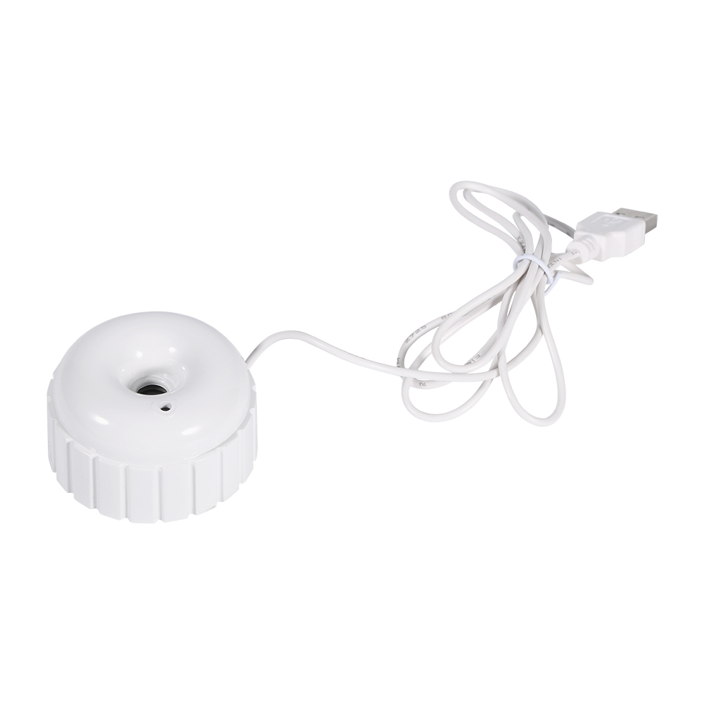 Ein weißer USB-Diffusor mit einem runden oberen Gehäuse und geripptem Rand.