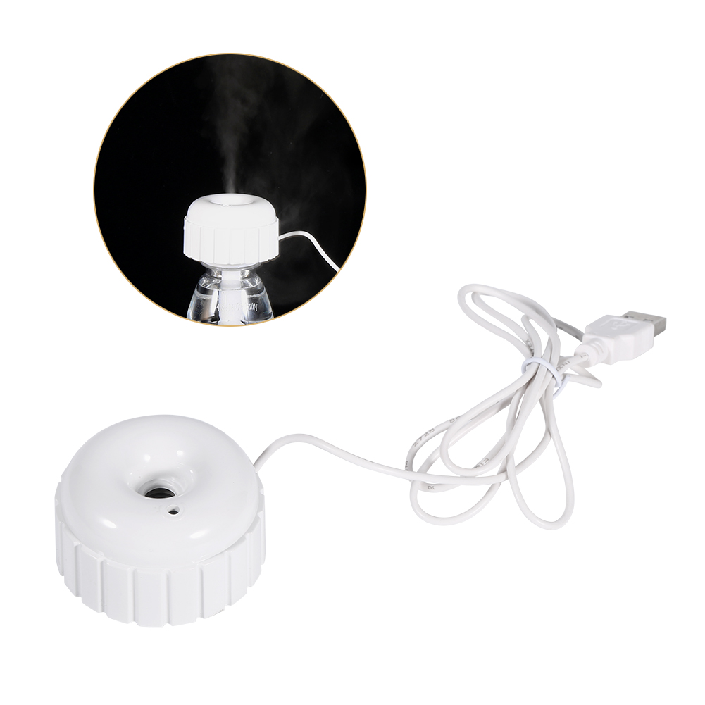 Ein weißer USB-Luftbefeuchter mit einem Ring aus Lamellen, der Dampf erzeugt.