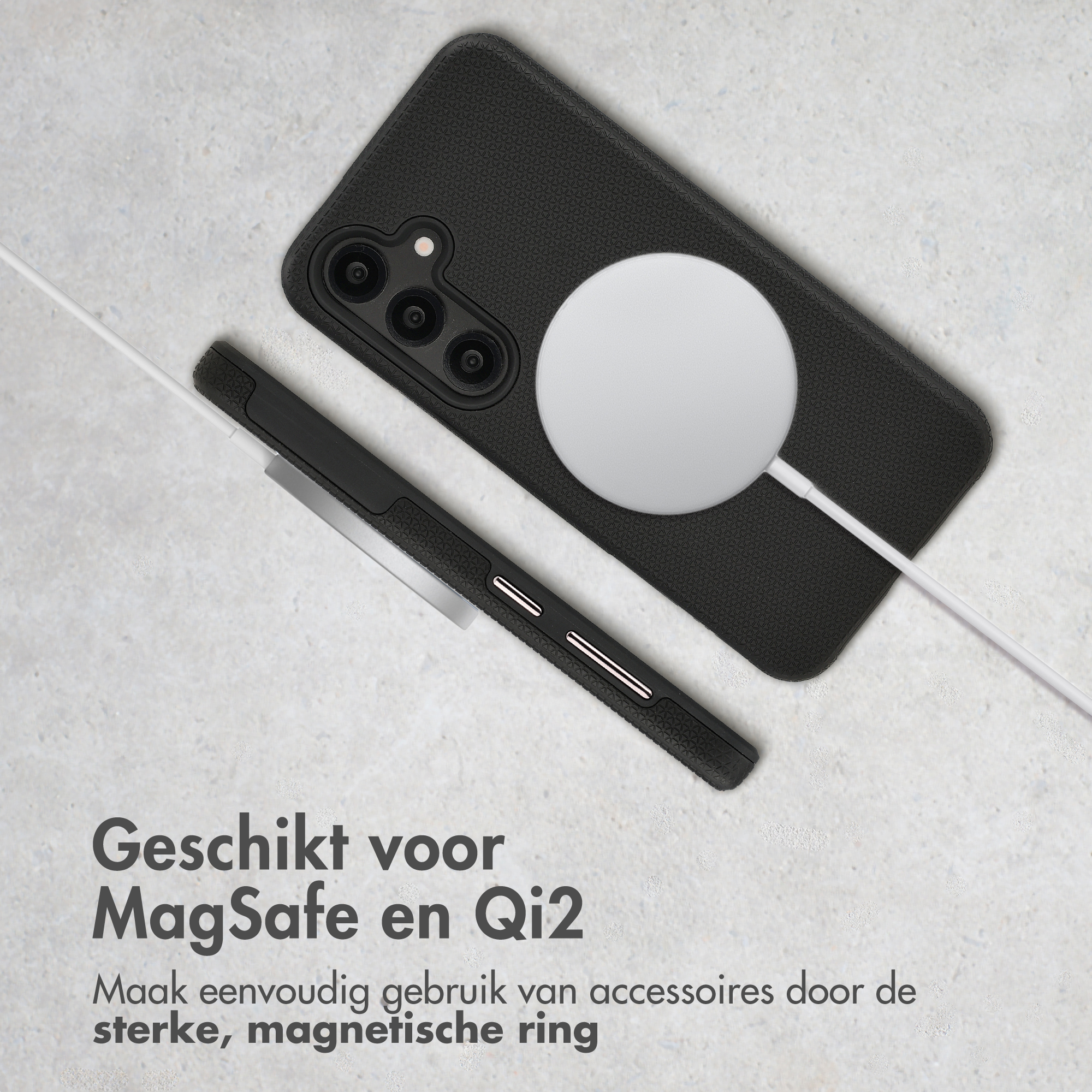 Téléphone noir avec chargeur MagSafe. Prêt pour MagSafe et Qi2.
