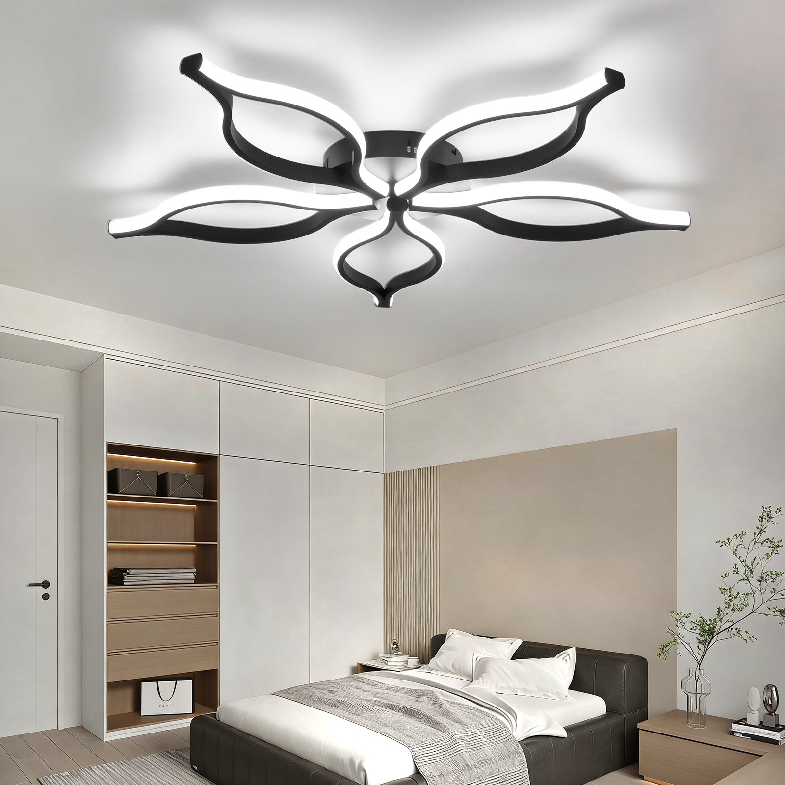 Una camera da letto moderna con lampadario floreale, letto e armadio.