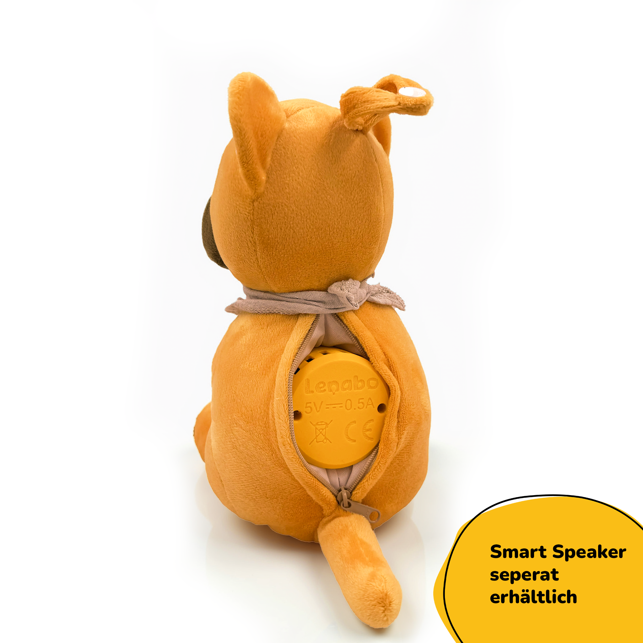 Ein orangefarbener Stoffhund mit offenem Reißverschluss am Rücken, der ein gelbes Fach zeigt.