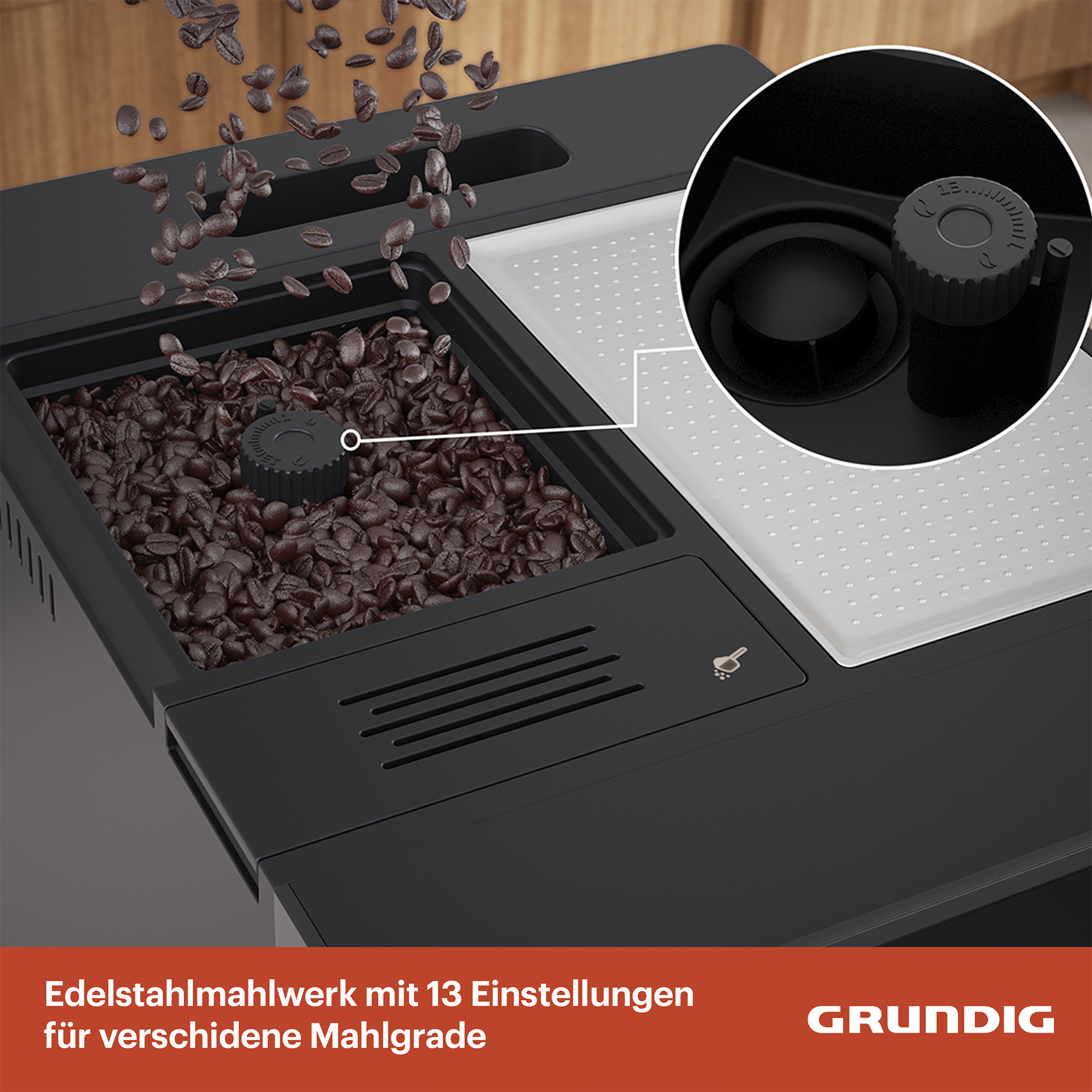 Kaffeebohnen fallen in einen Behälter mit Mahlwerk. Nahaufnahme.