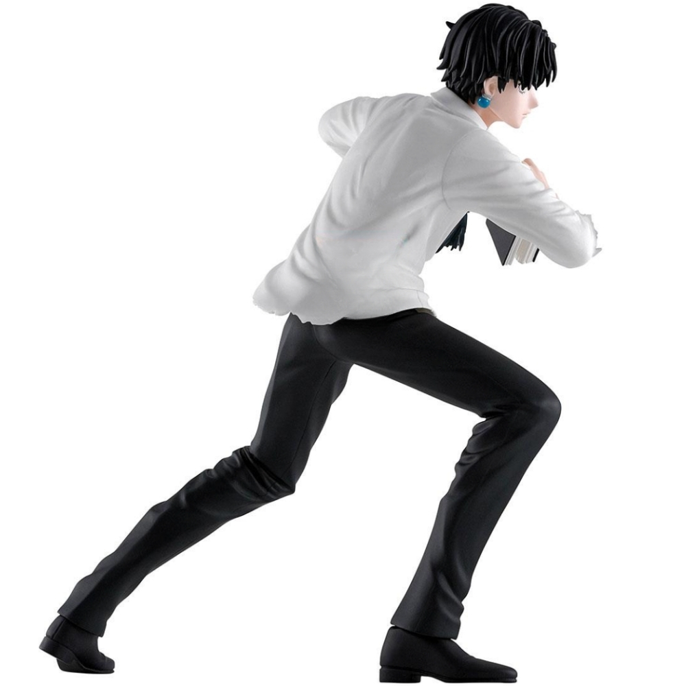 Eine Figur eines Mannes mit schwarzen Haaren, der ein weißes Hemd und schwarze Hose trägt.