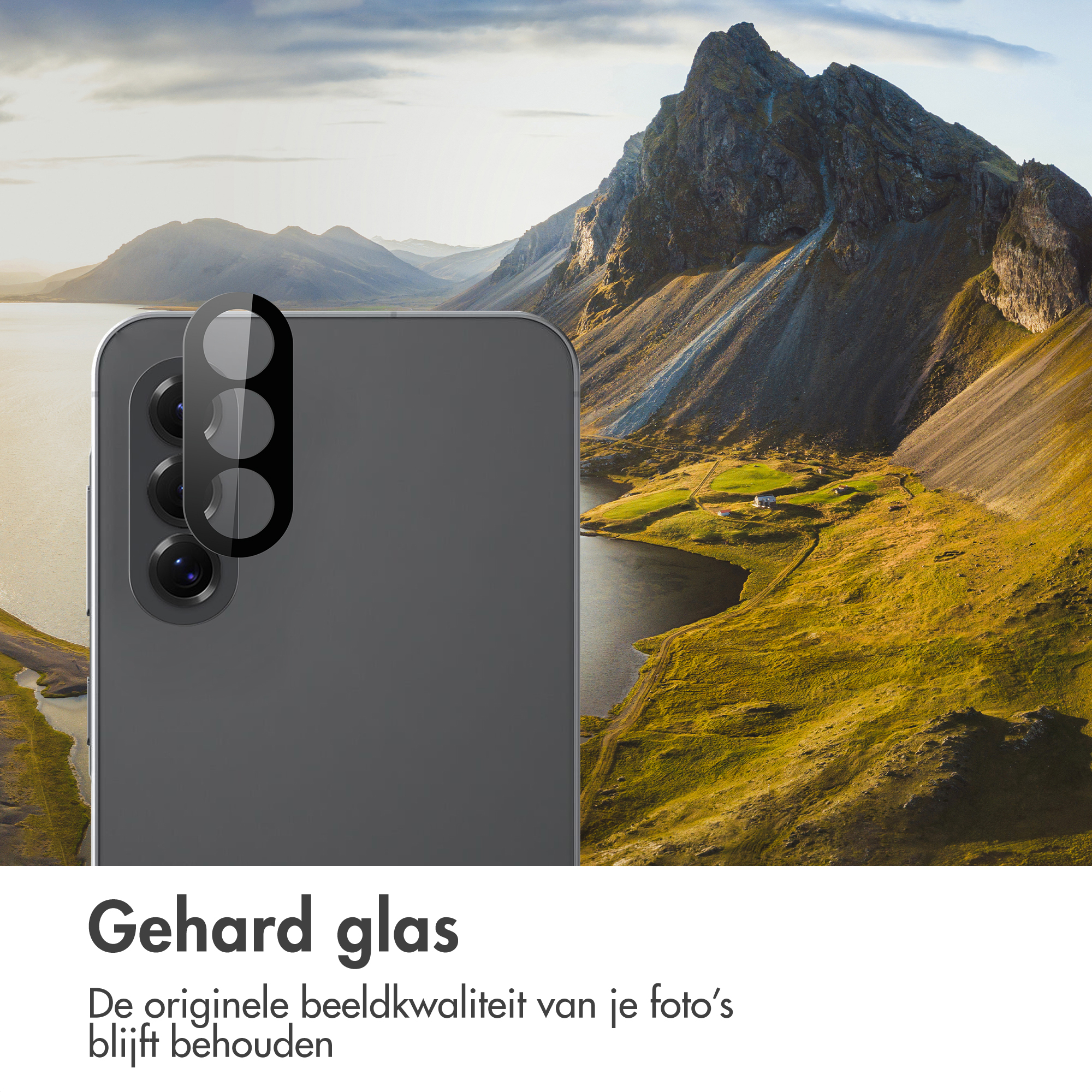 Grijze smartphone met cameralensbeschermer voor berglandschap