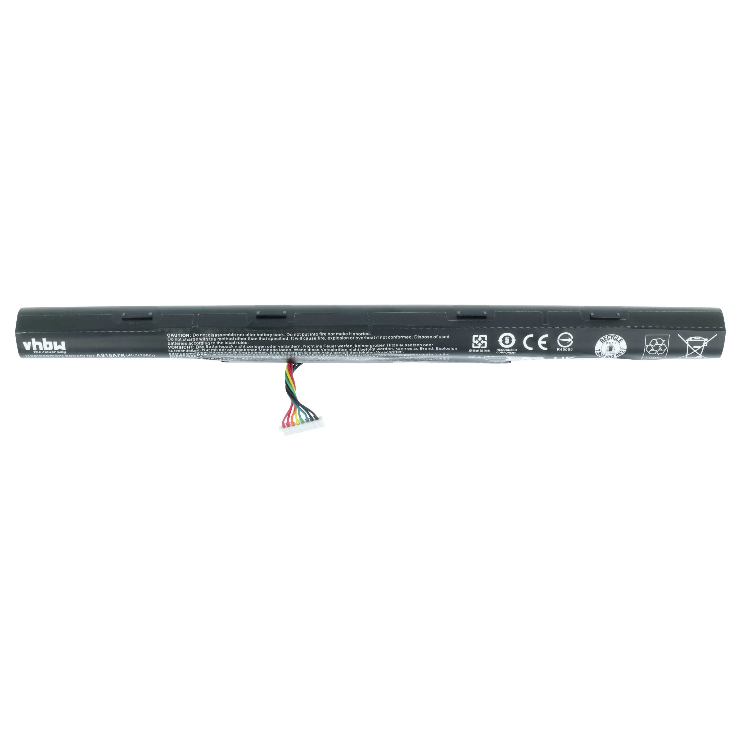 Schwarzer Laptop-Akku mit Kabeln, Aufschriften und Symbolen.