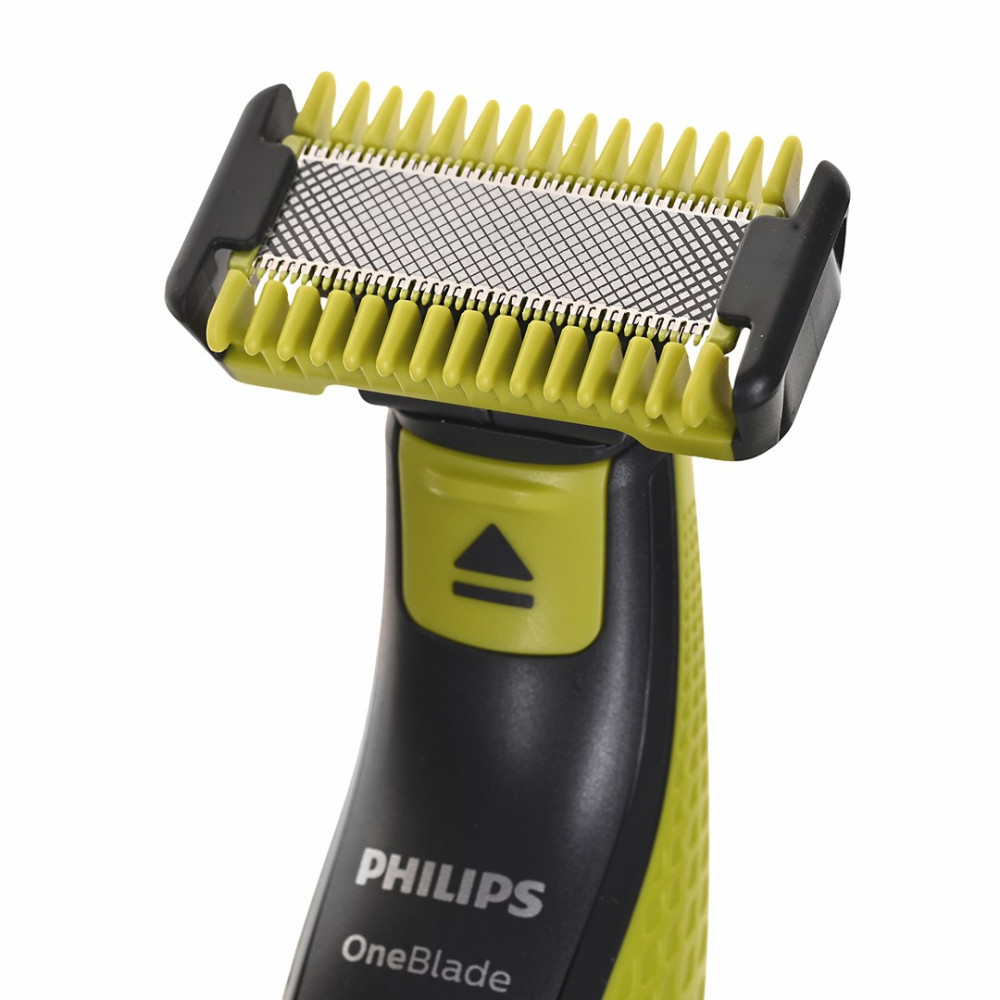Trymer Philips OneBlade z żółtą nasadką i srebrnym ostrzem na czarnej rączce.