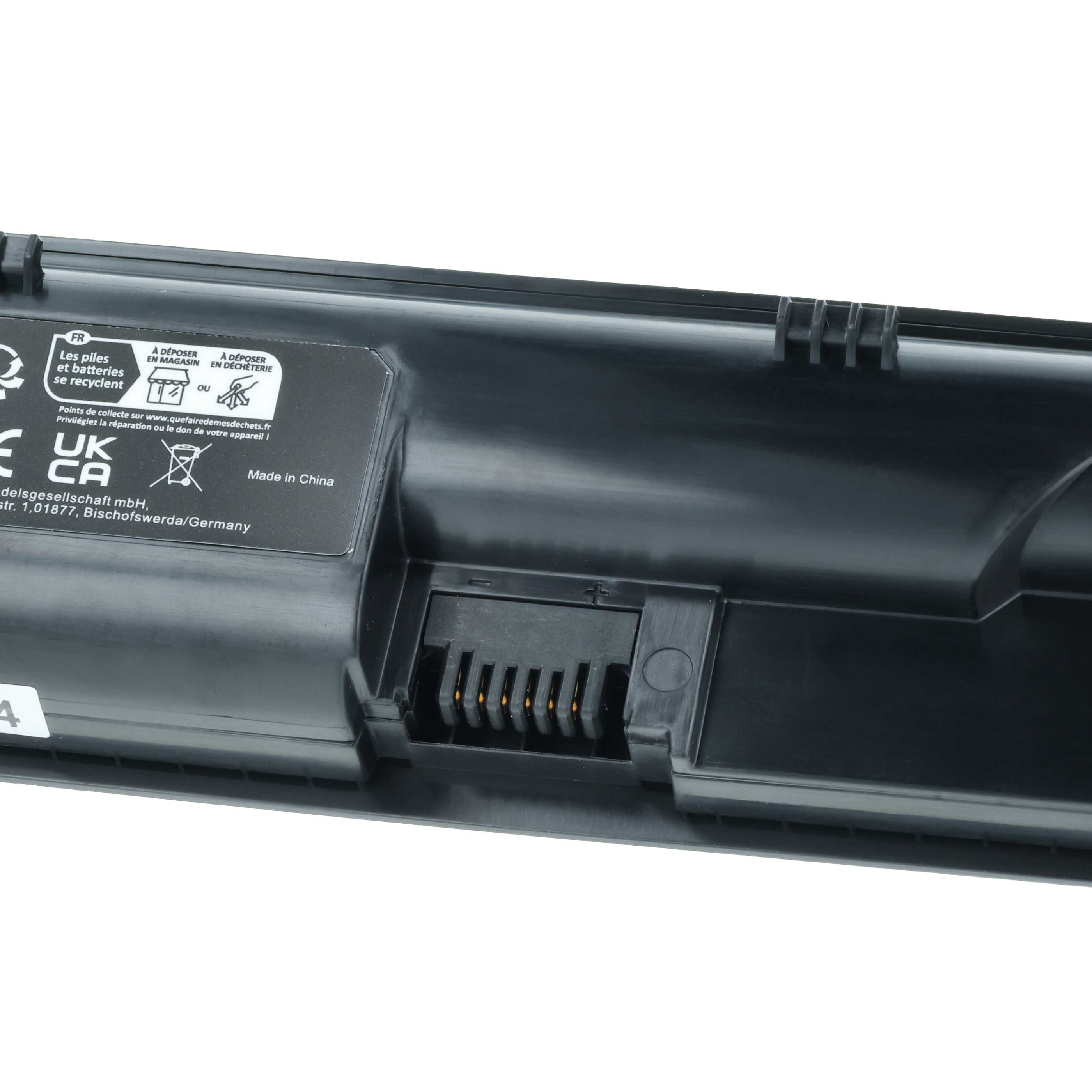 Schwarzer Laptop-Akku mit Anschlüssen und Recycling-Symbolen.