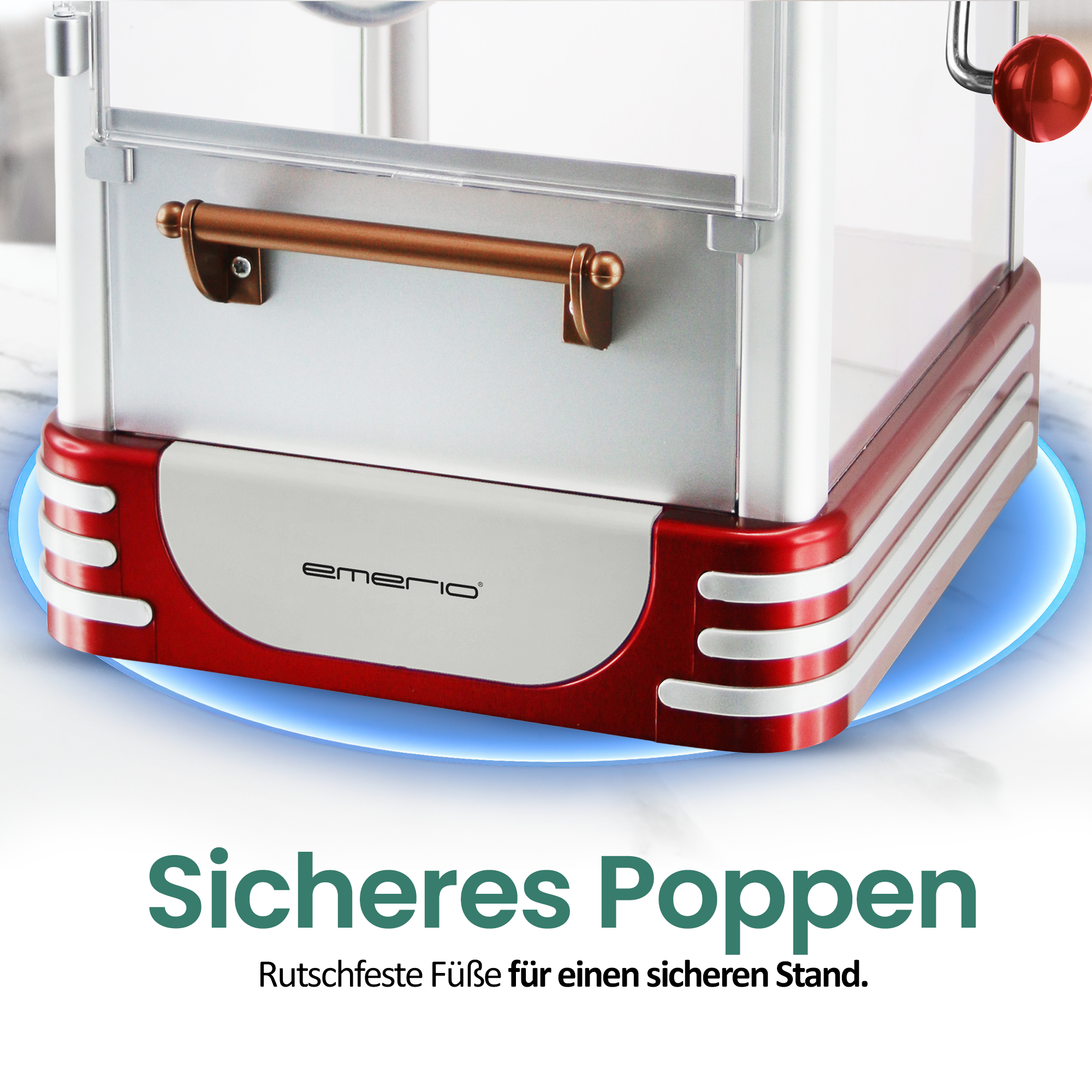 Ein roter Popcornautomat mit silbernen Akzenten steht auf einer Marmoroberfläche.