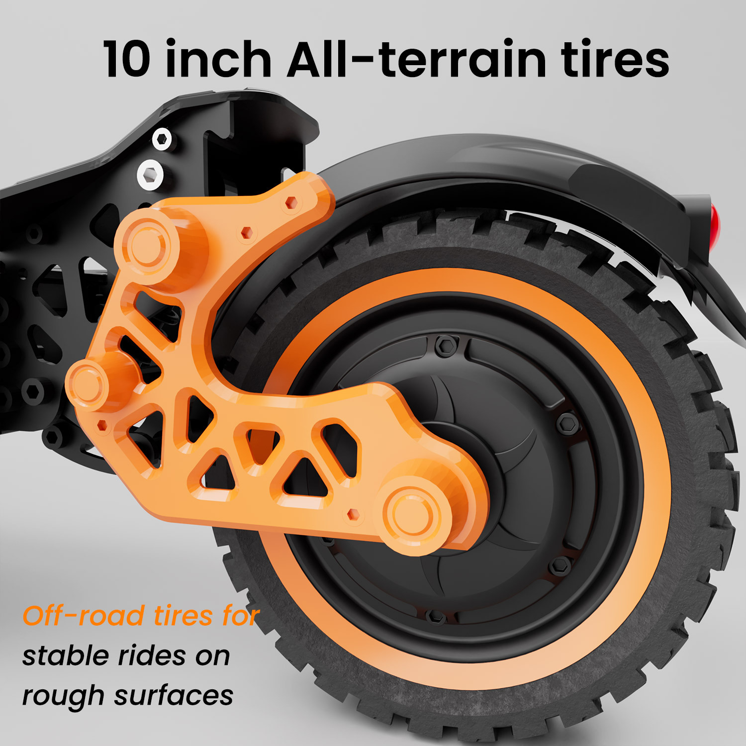 Zbliżenie na pomarańczowe ramię i oponę terenową 10 cali.