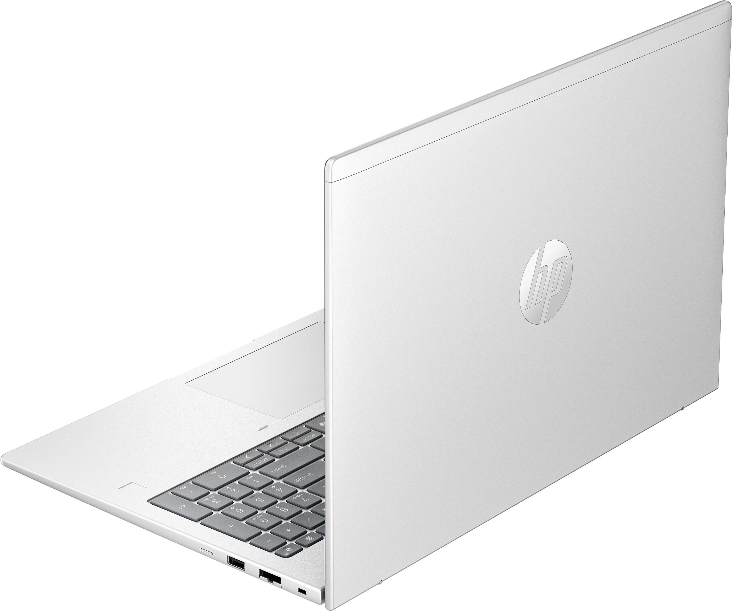 Srebrny laptop HP jest otwarty, widać klawiaturę i touchpad. Widoczne logo HP.