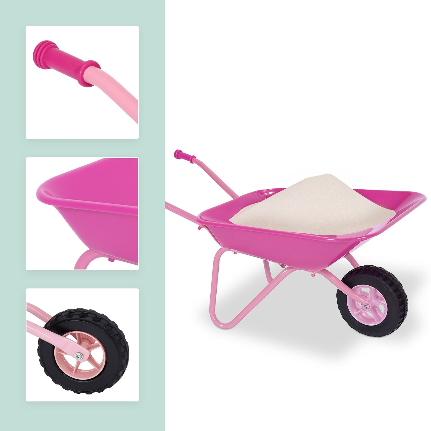Una carretilla rosa llena de arena, con primeros planos del mango, la cubeta y la rueda.