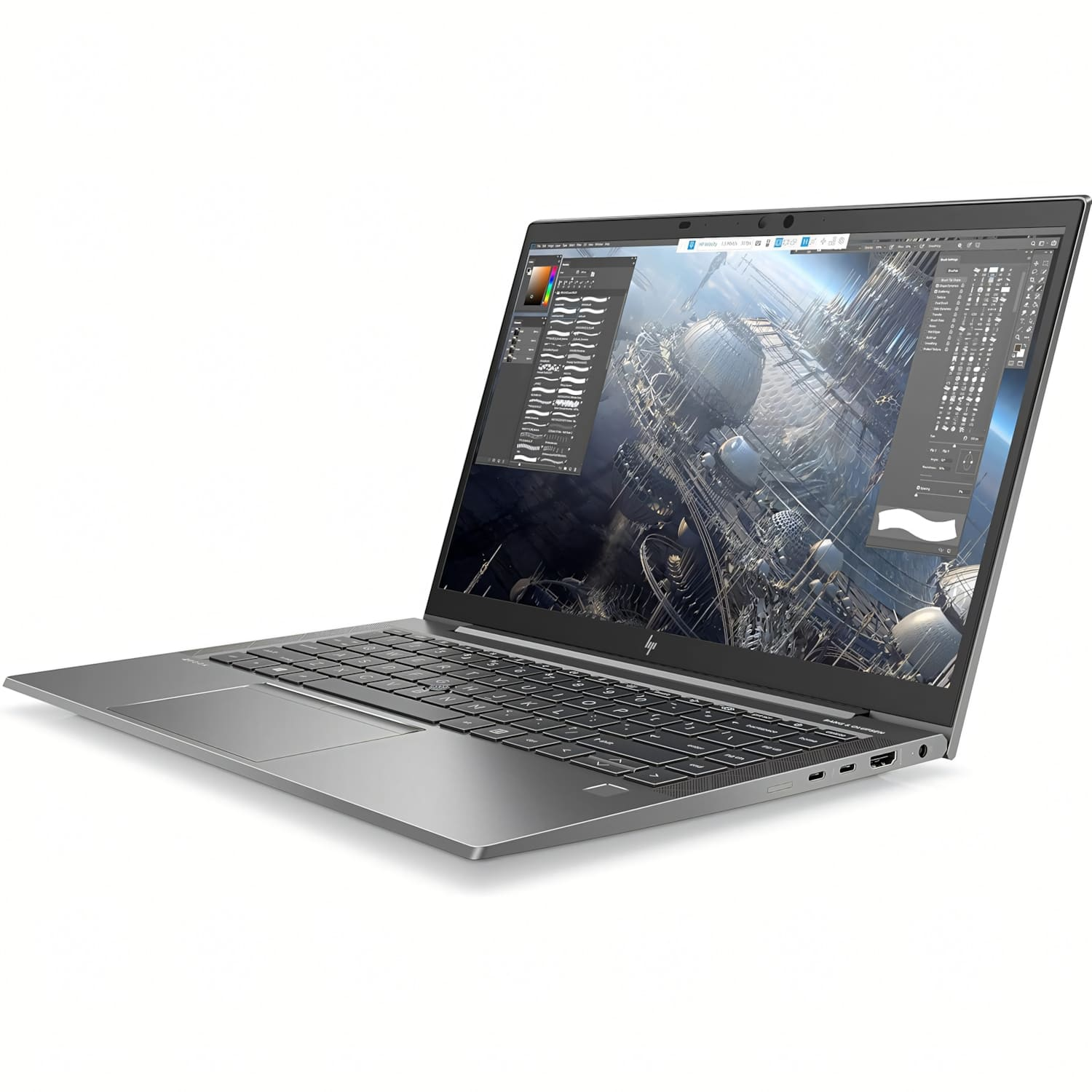 Ein geöffneter silberner Laptop mit komplexer digitaler Kunst auf dem Bildschirm.