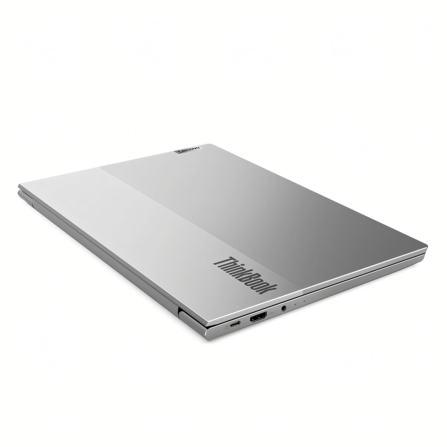 Un portátil Lenovo ThinkBook plateado y cerrado sobre fondo blanco.