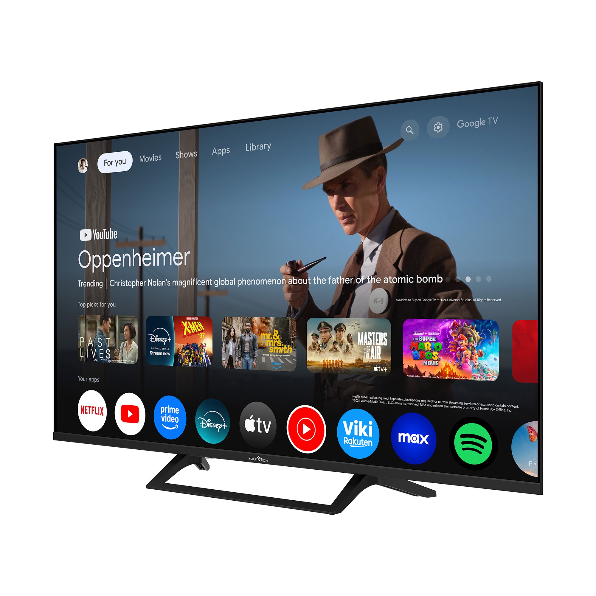 Un televisor moderno con interfaz Google TV, mostrando películas como Oppenheimer.