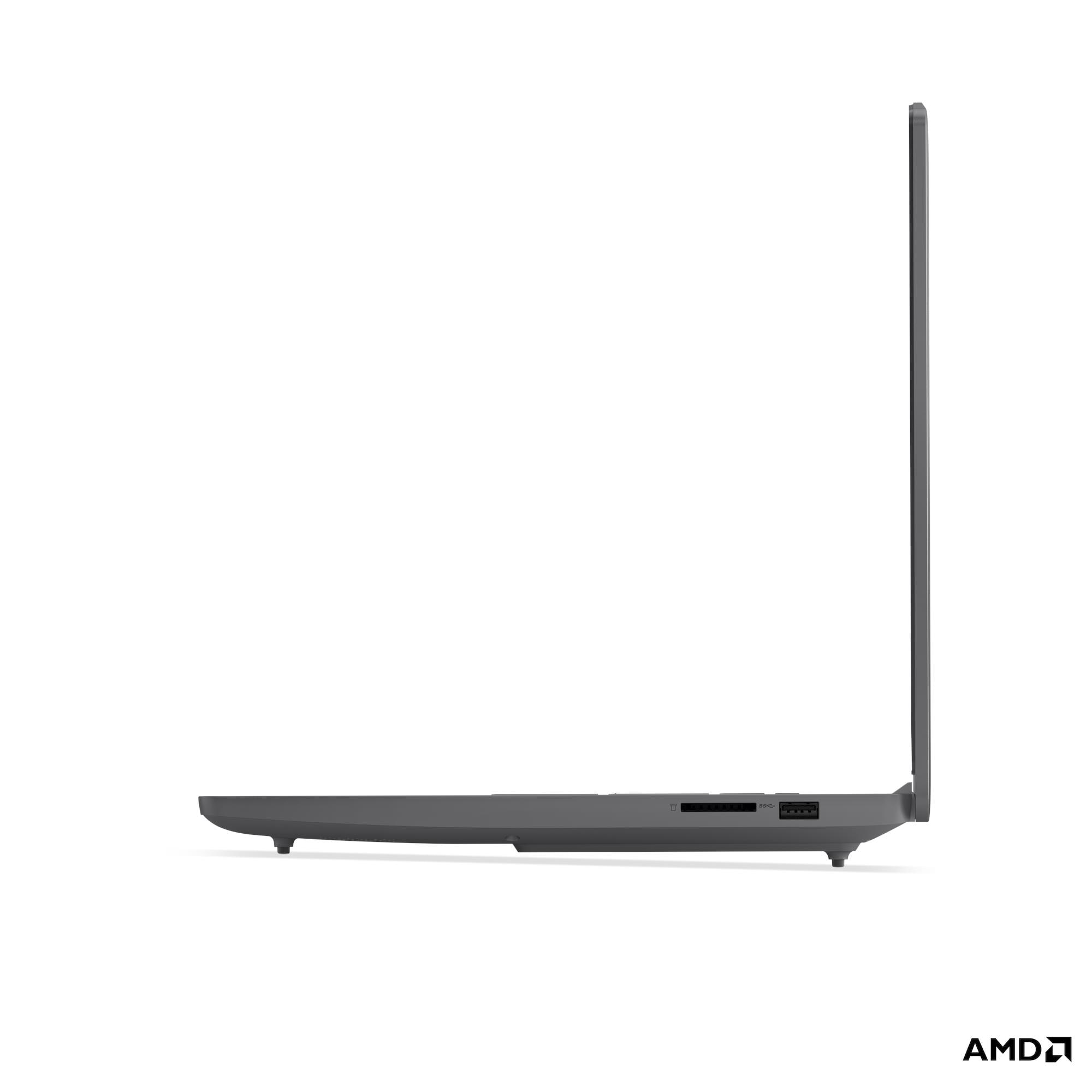Laptop grigio di profilo, con porte USB e lettore di schede SD.