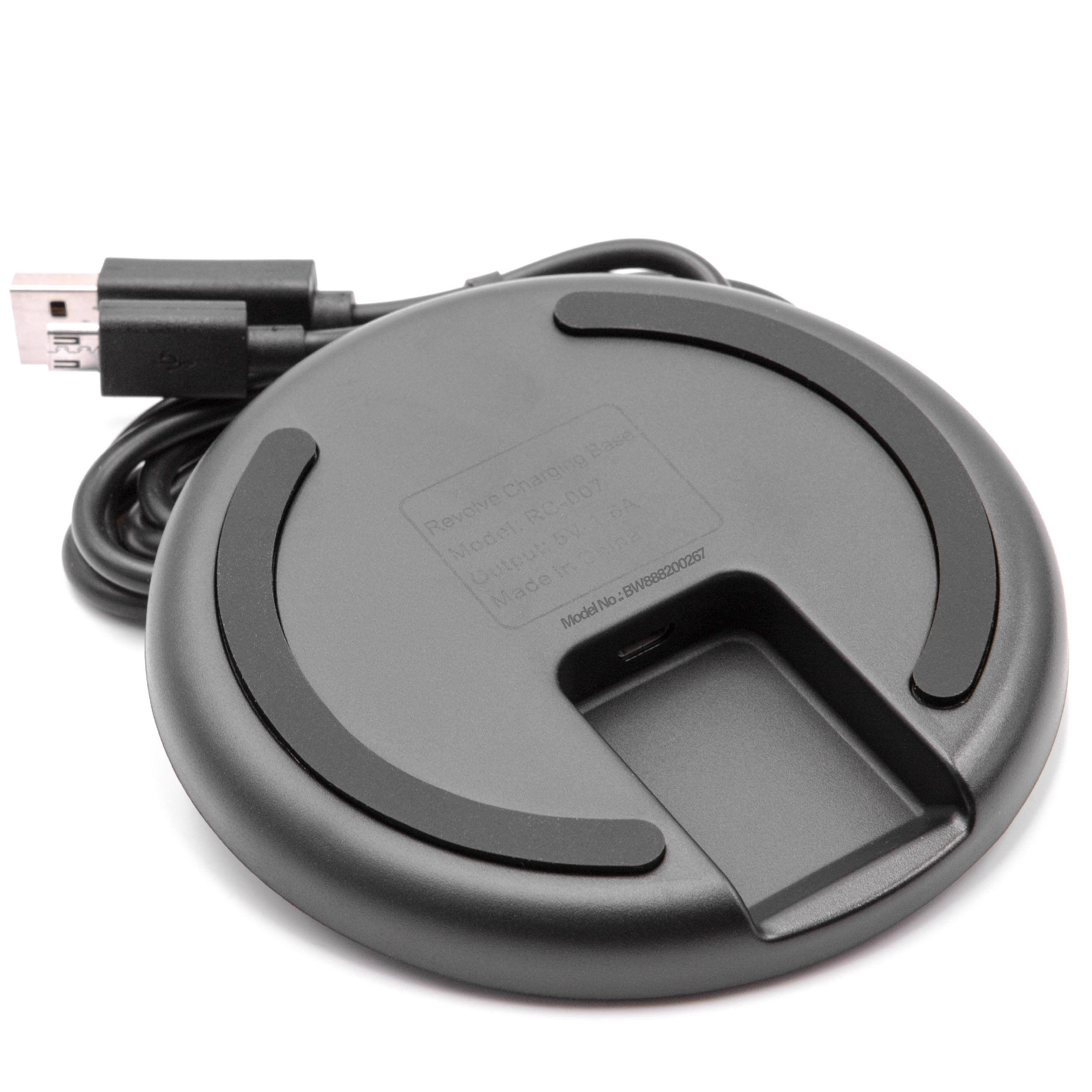 Schwarze Ladebasis mit USB-Kabel und Beschriftung.
