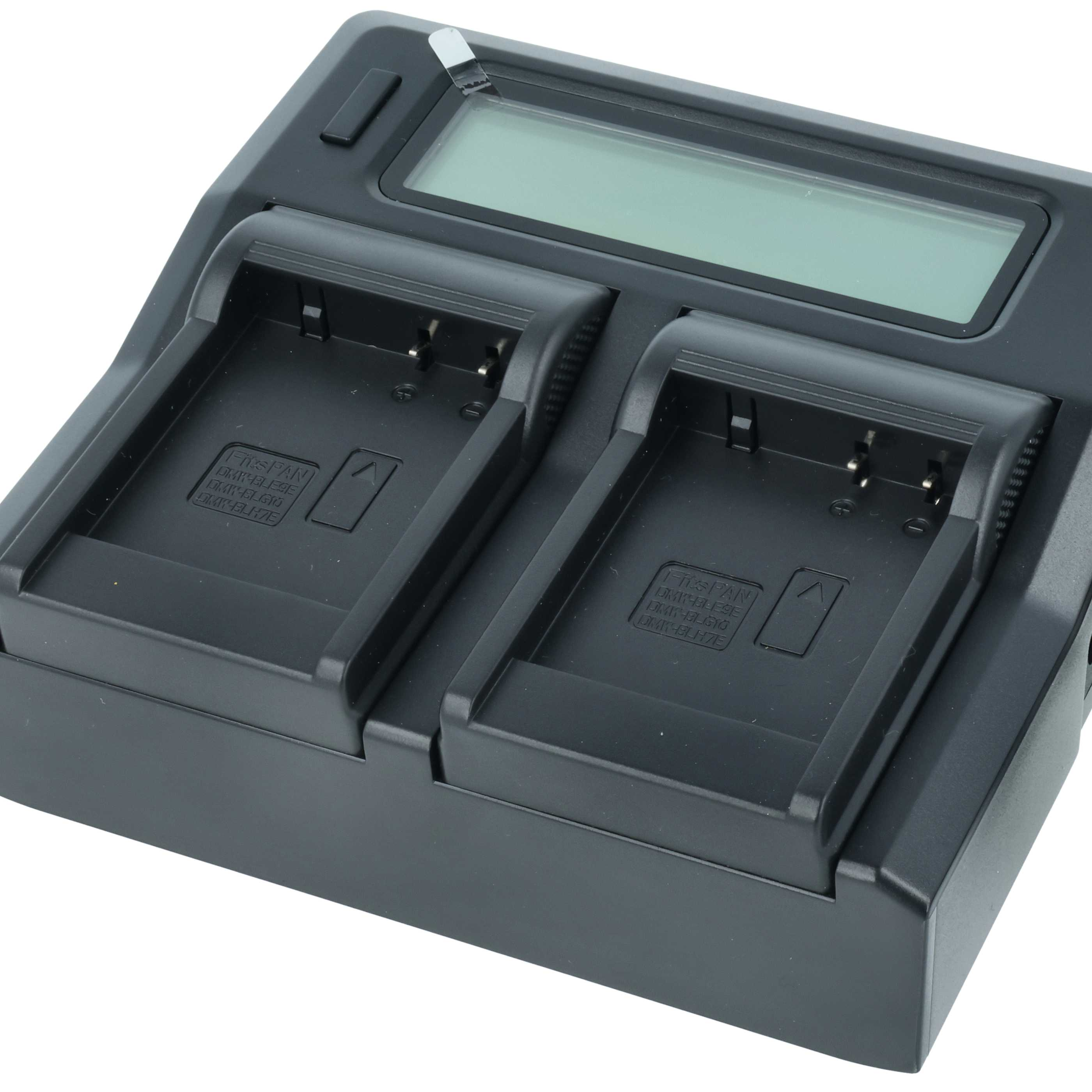 Ein schwarzes Ladegerät mit zwei Steckplätzen und einem LCD-Bildschirm.