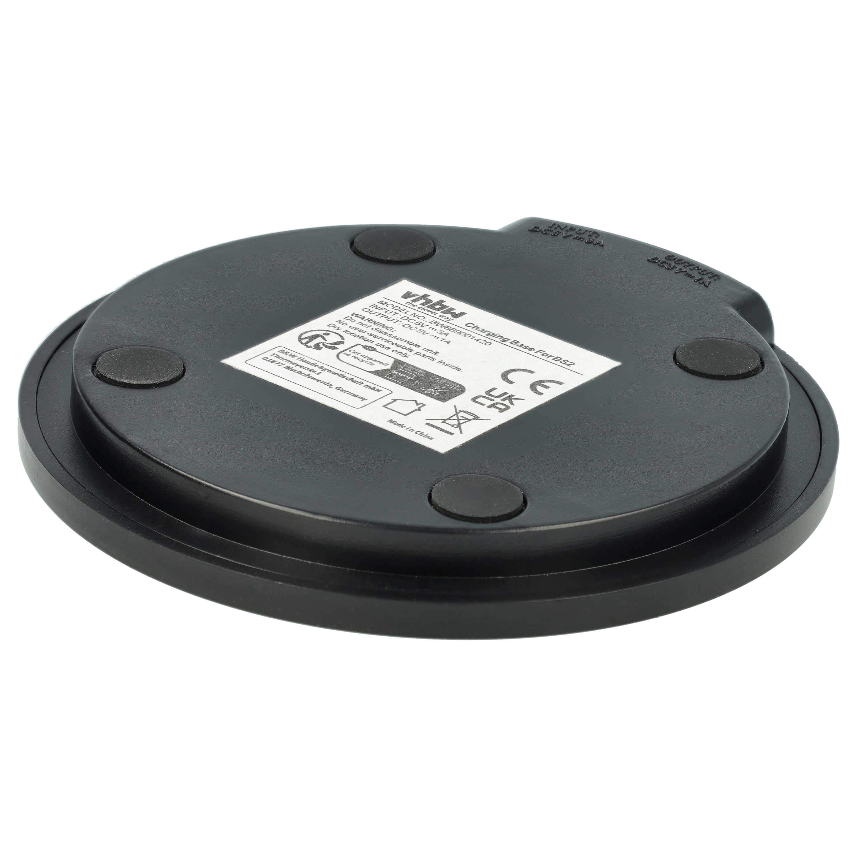 Schwarze Ladebasis mit Etikett und Gummifüßen. Input: DC5V=3A, Output: DC5V=1A.