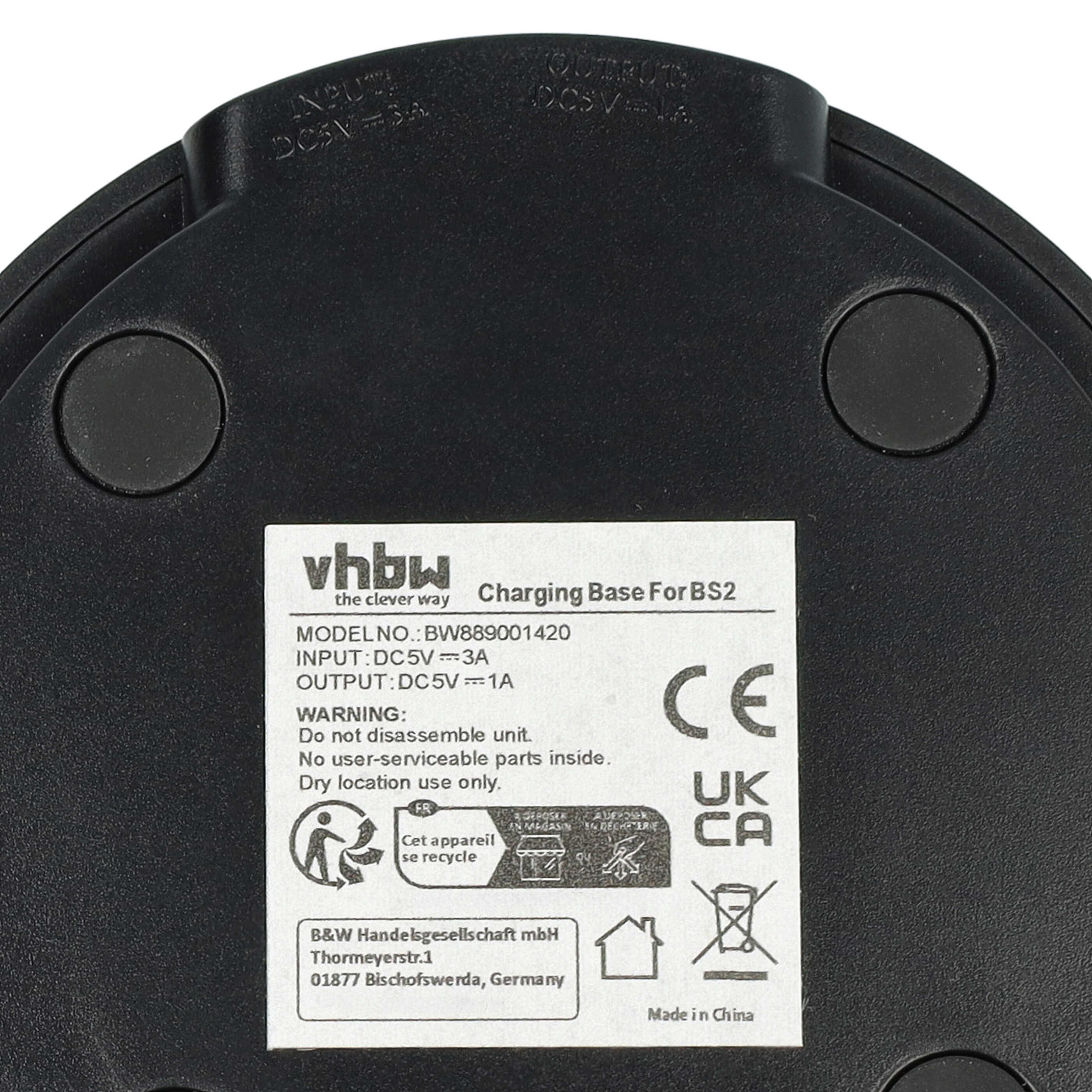 Schwarze Ladestation mit Beschriftung: Eingang DC5V=3A, Ausgang DC5V=1A.