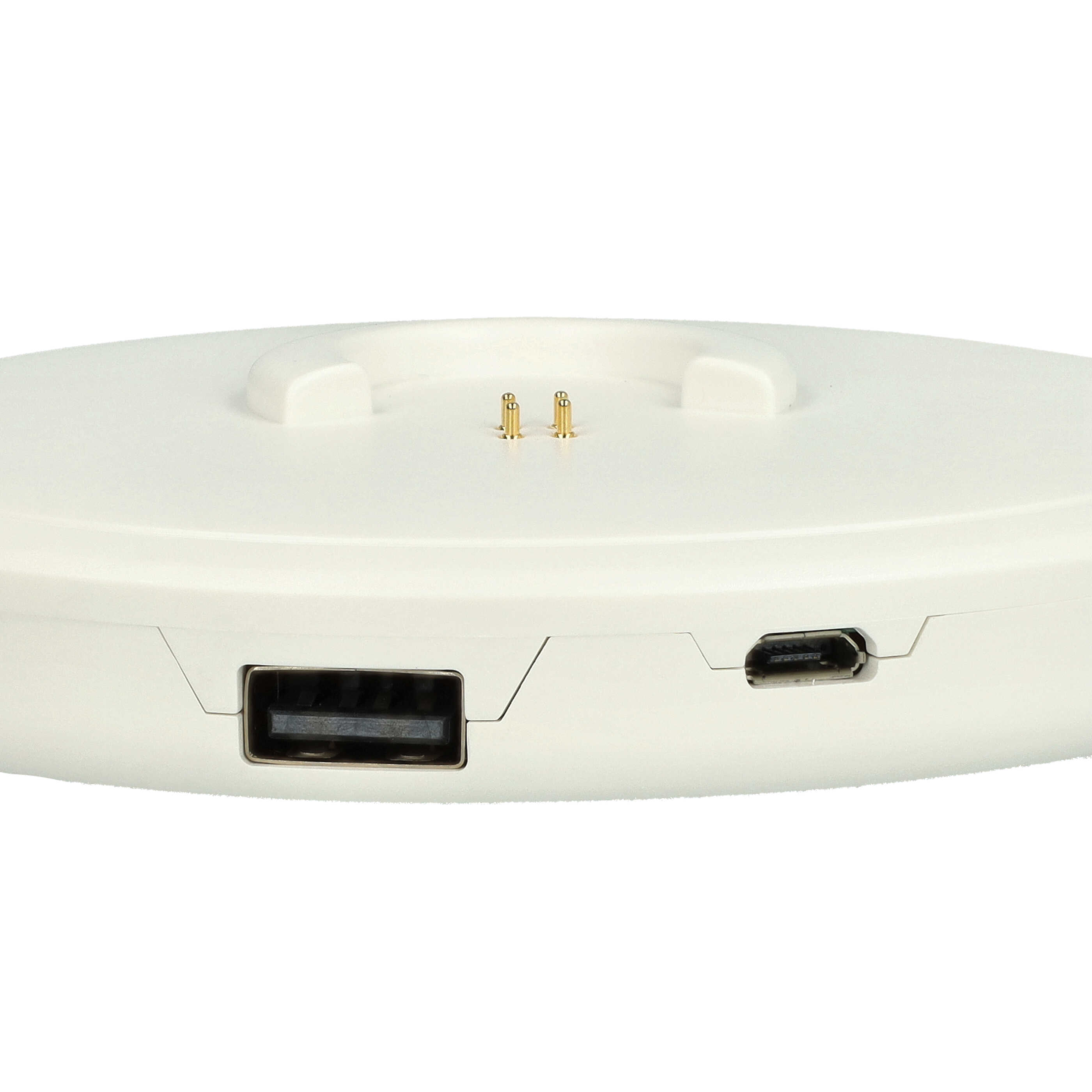 Ein weißes Lade-/Dockinggerät mit USB- und Micro-USB-Anschlüssen.