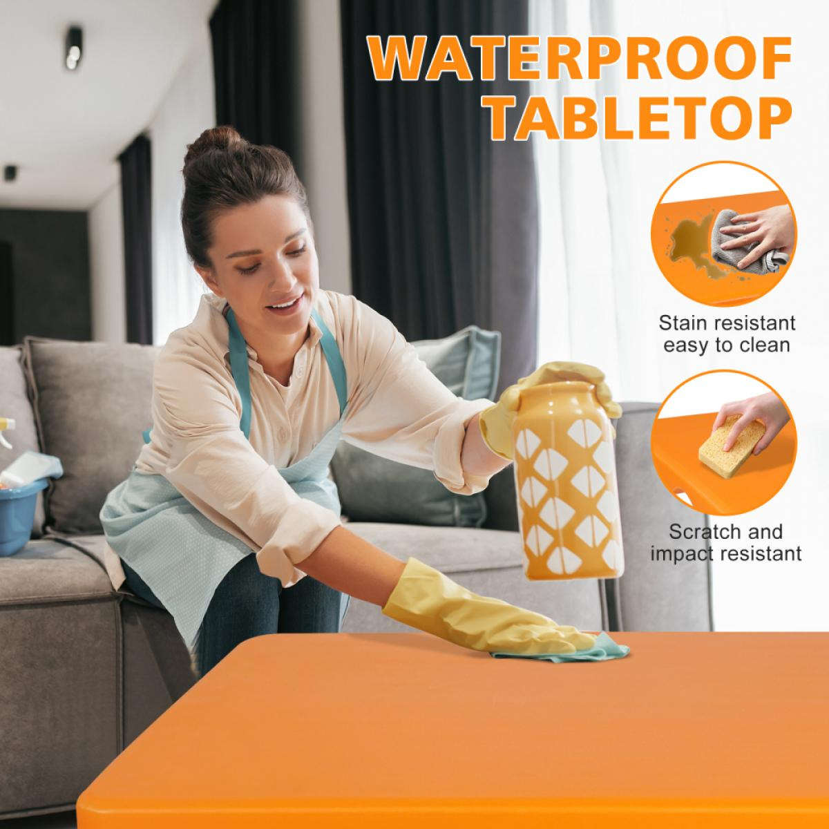 Frau wischt orange Tischplatte ab. "Wasserfeste Tischplatte".