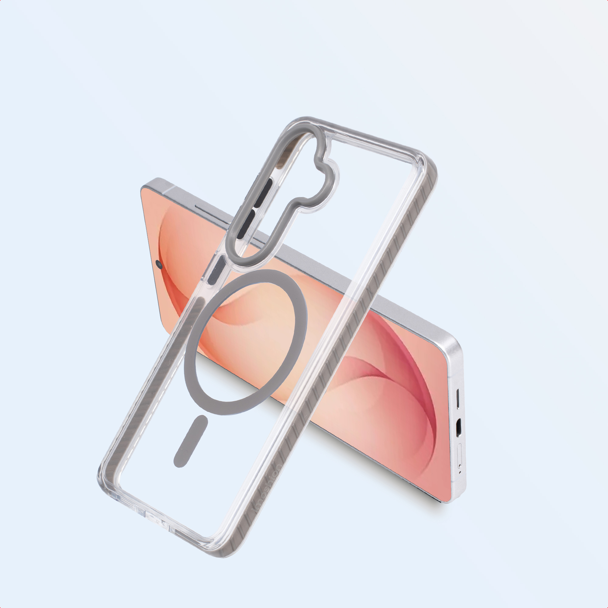 Een doorzichtige telefoonhoes met MagSafe-ring op een telefoon met roze achtergrond.